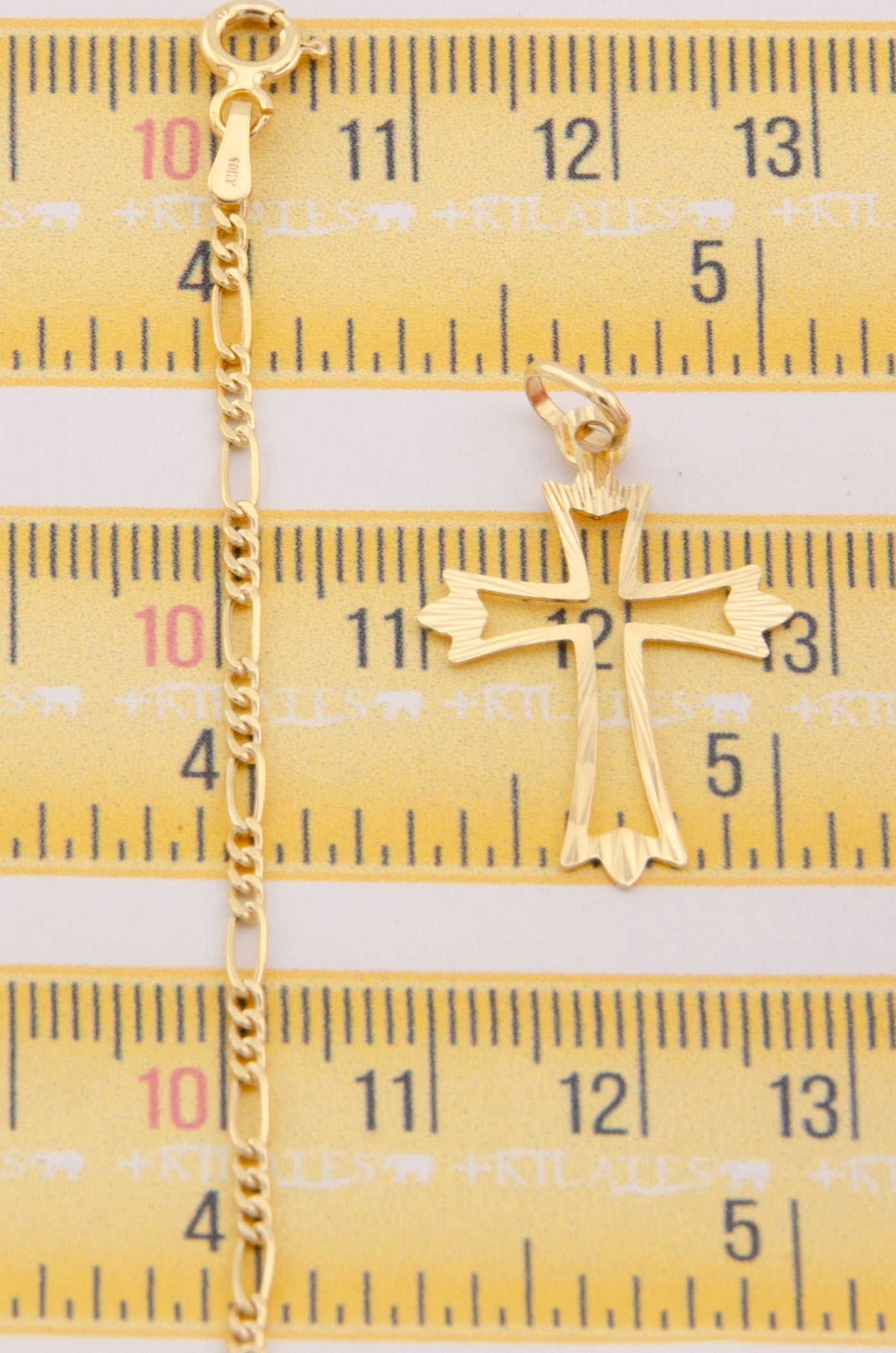 CADENA PARA ADULTO DE 60CM ESTILO 3+1 CON DIJE DE CRUZ MEDIANA. ORO 10K. #775-2936