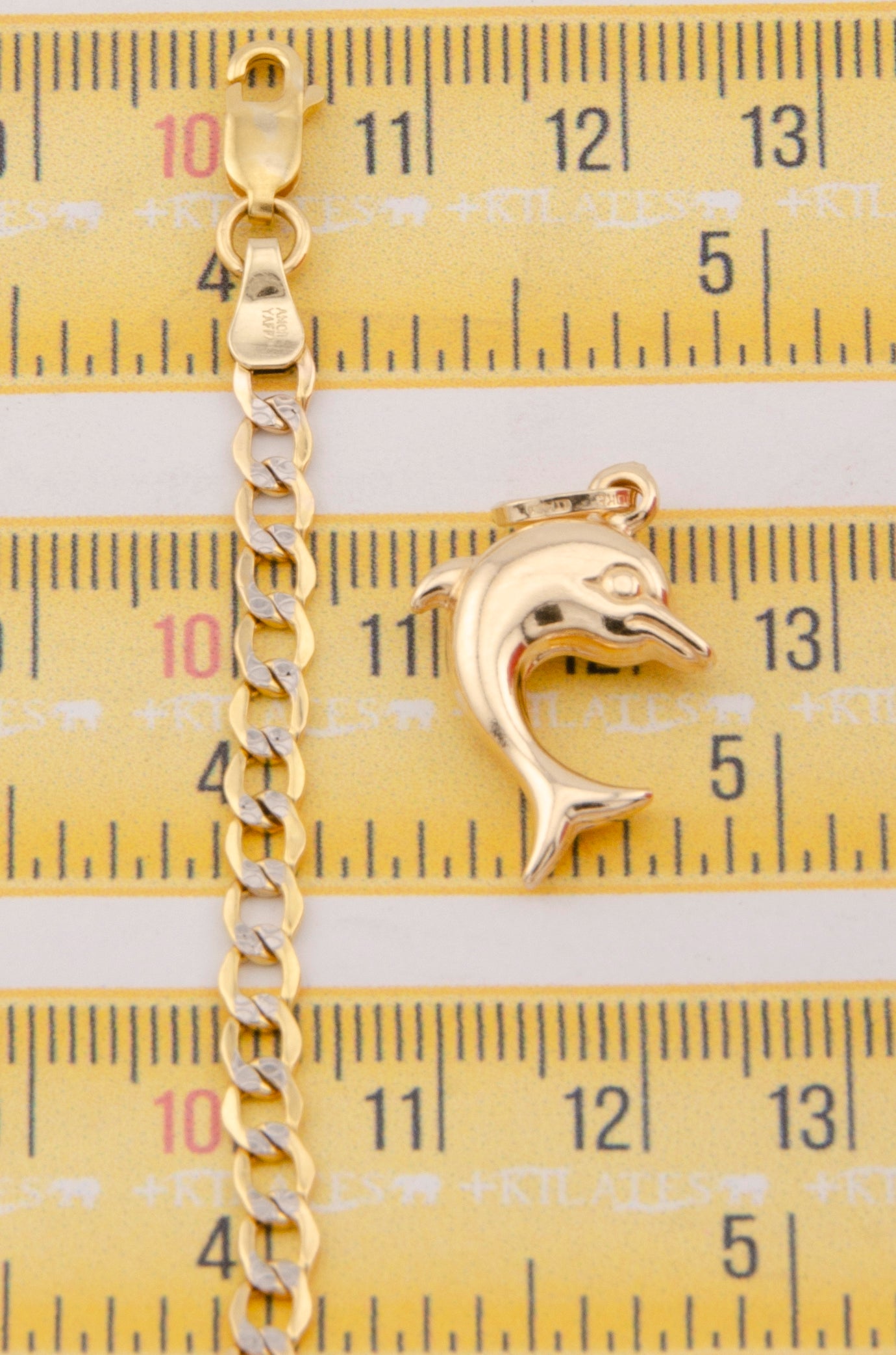 "CADENA DE 60CM PARA ADULTO ESTILO CUBANA DIAMANTADA CON DIJE DE DELFIN GRANDE. ORO 10K #775-3027"