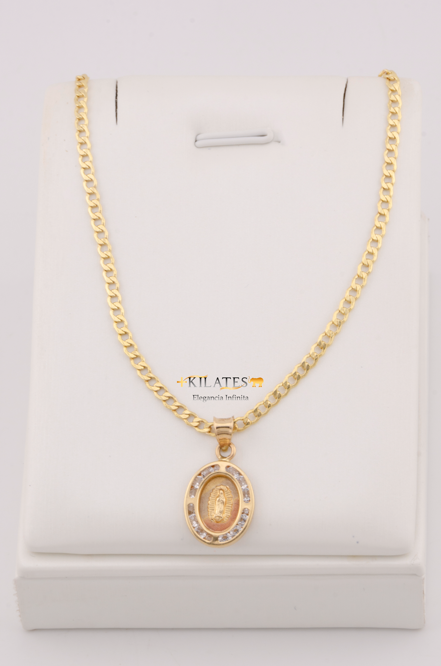 "CADENA DE 50CM PARA ADULTO ESTILO CUBANA CON DIJE DE LA VIRGEN OVALADO MEDIANO CON ZIRCONIA BLANCA . ORO 10K #775-3099"