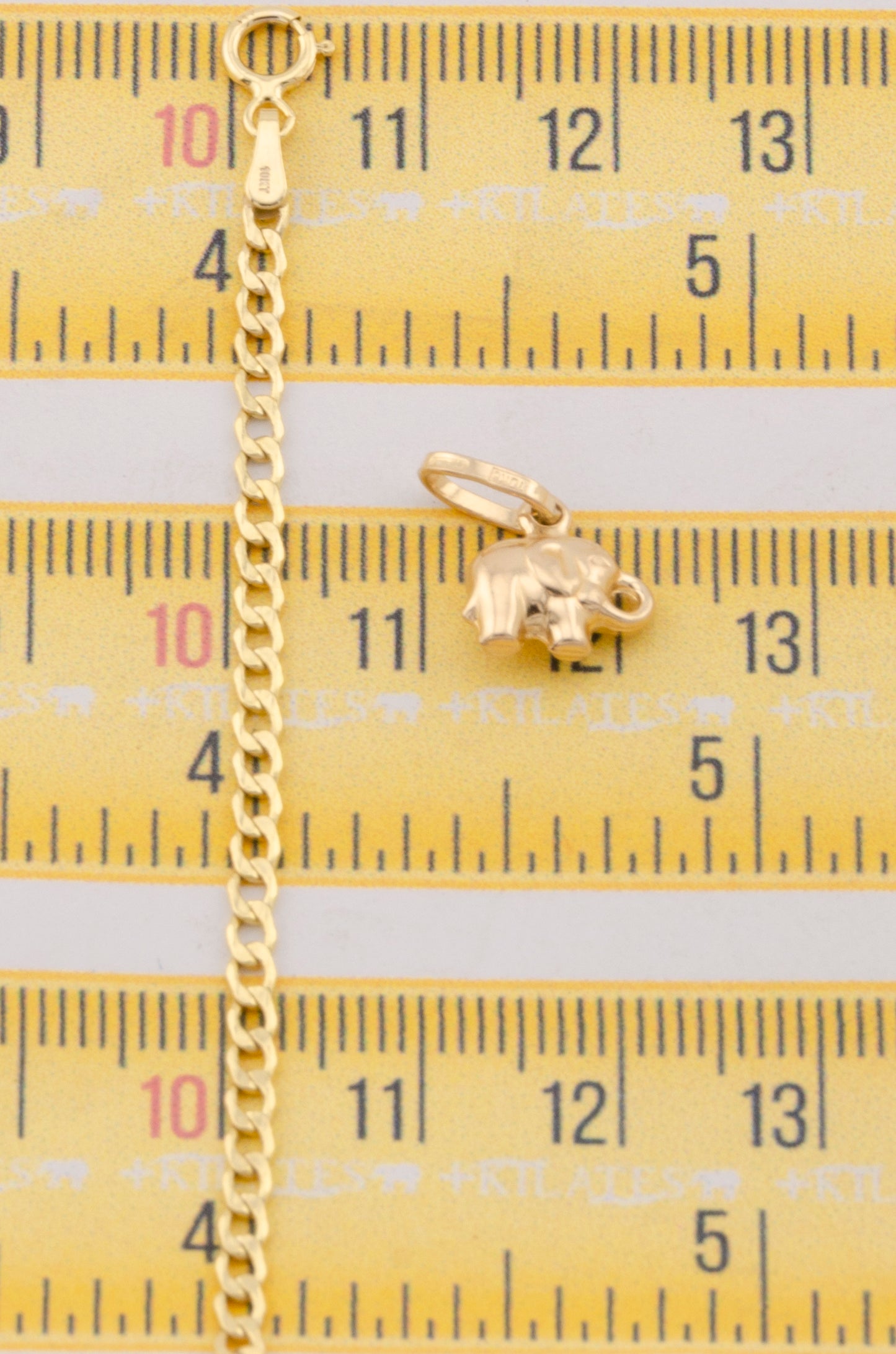 "CADENA DE 50CM PARA ADULTO ESTILO CUBANA CON DIJE DE ESTRELLA DE ELEFANTE PEQUEÑO. ORO 10K #775-3122"