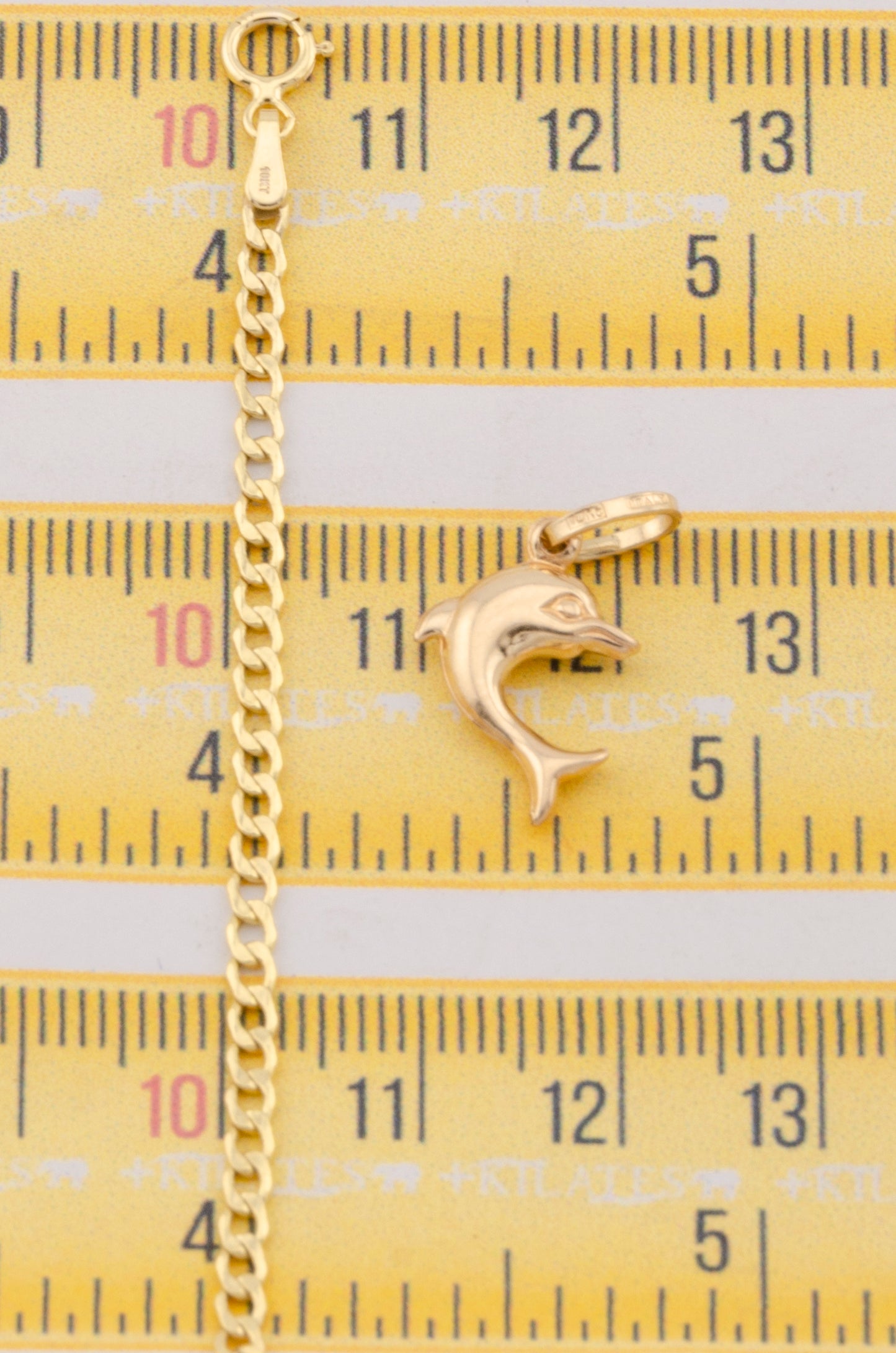 "CADENA DE 50CM PARA ADULTO ESTILO CUBANA CON DIJE DE ESTRELLA DE DELFIN MEDIANO. ORO 10K #775-3124"