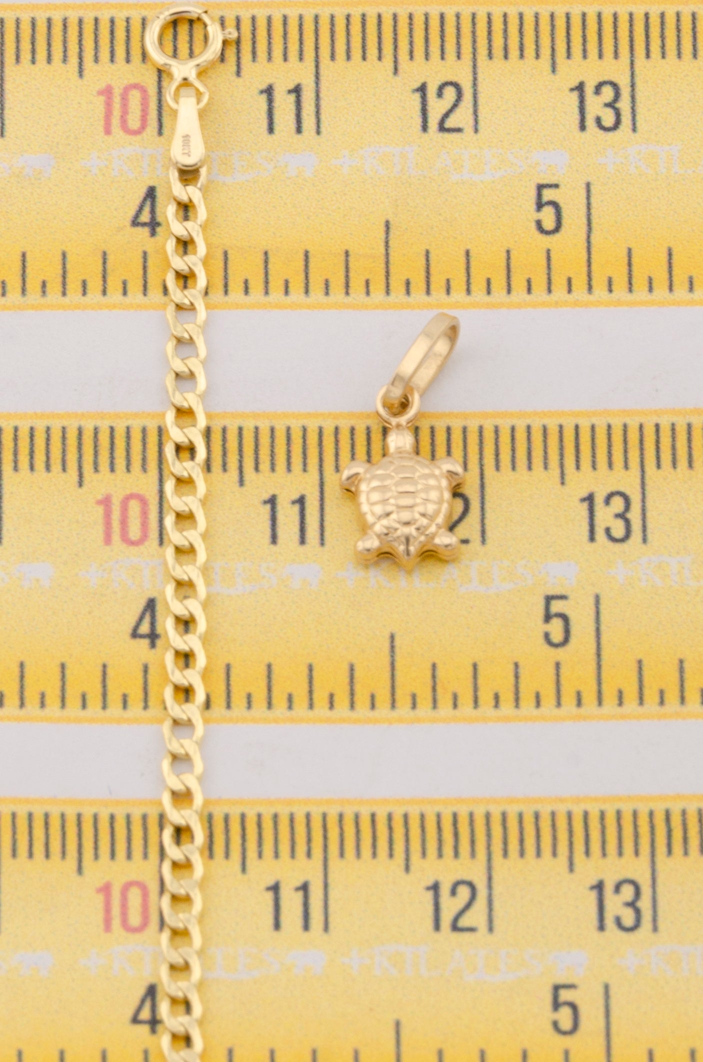 "CADENA DE 50CM PARA ADULTO ESTILO CUBANA CON DIJE DE ESTRELLA DE TORTUGA. ORO 10K #775-3127"