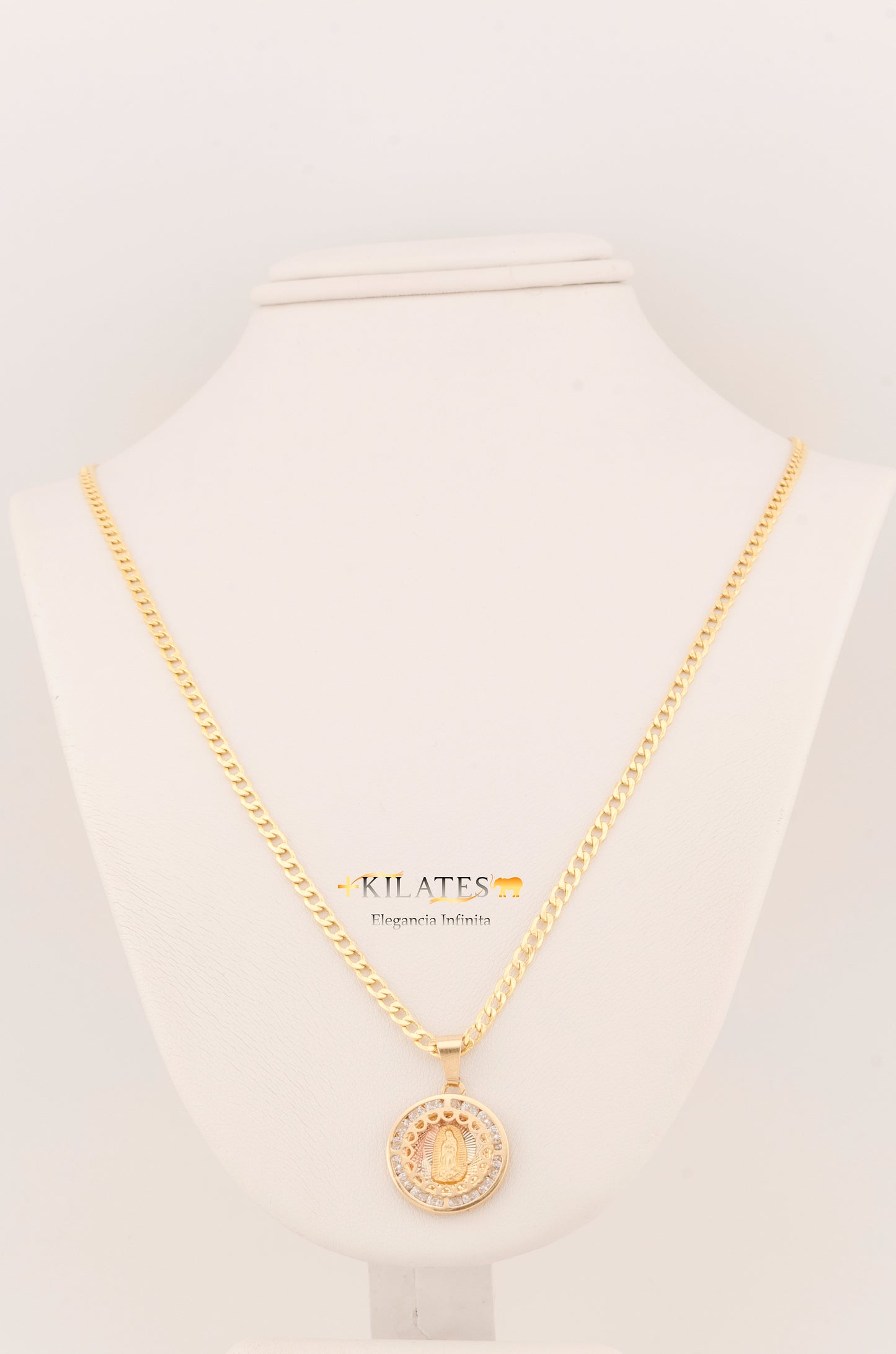 "CADENA DE 50CM PARA ADULTO ESTILO CUBANA CON DIJE DE LA VIRGEN RENDONDO MEDIANO CON ZIRCONIA BLANCA. ORO 10K #775-3098"