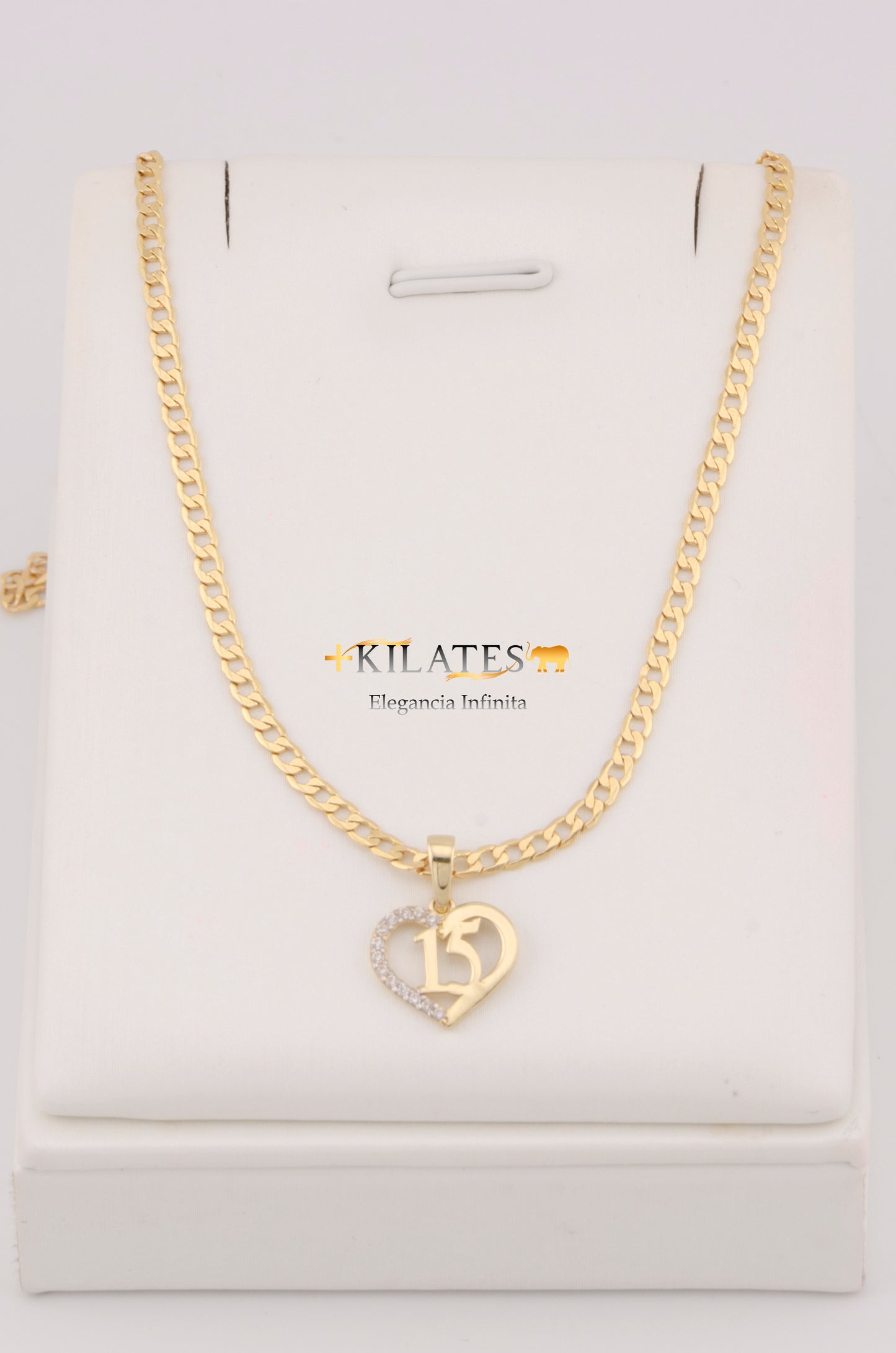 CADENA DE 50CM PARA ADULTO ESTILO CUBANA CON DIJE DE 15 AÑOS . ORO 10K #775-3215
