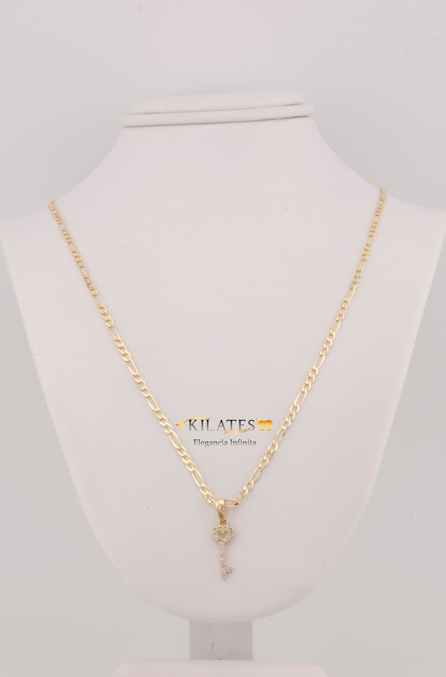 "CADENA DE 50CM PARA ADULTO ESTILO 3+1 SOLIDA CON DIJE DE LLAVE CON ZIRCONIA BLANCA. ORO 10K #775-3287"