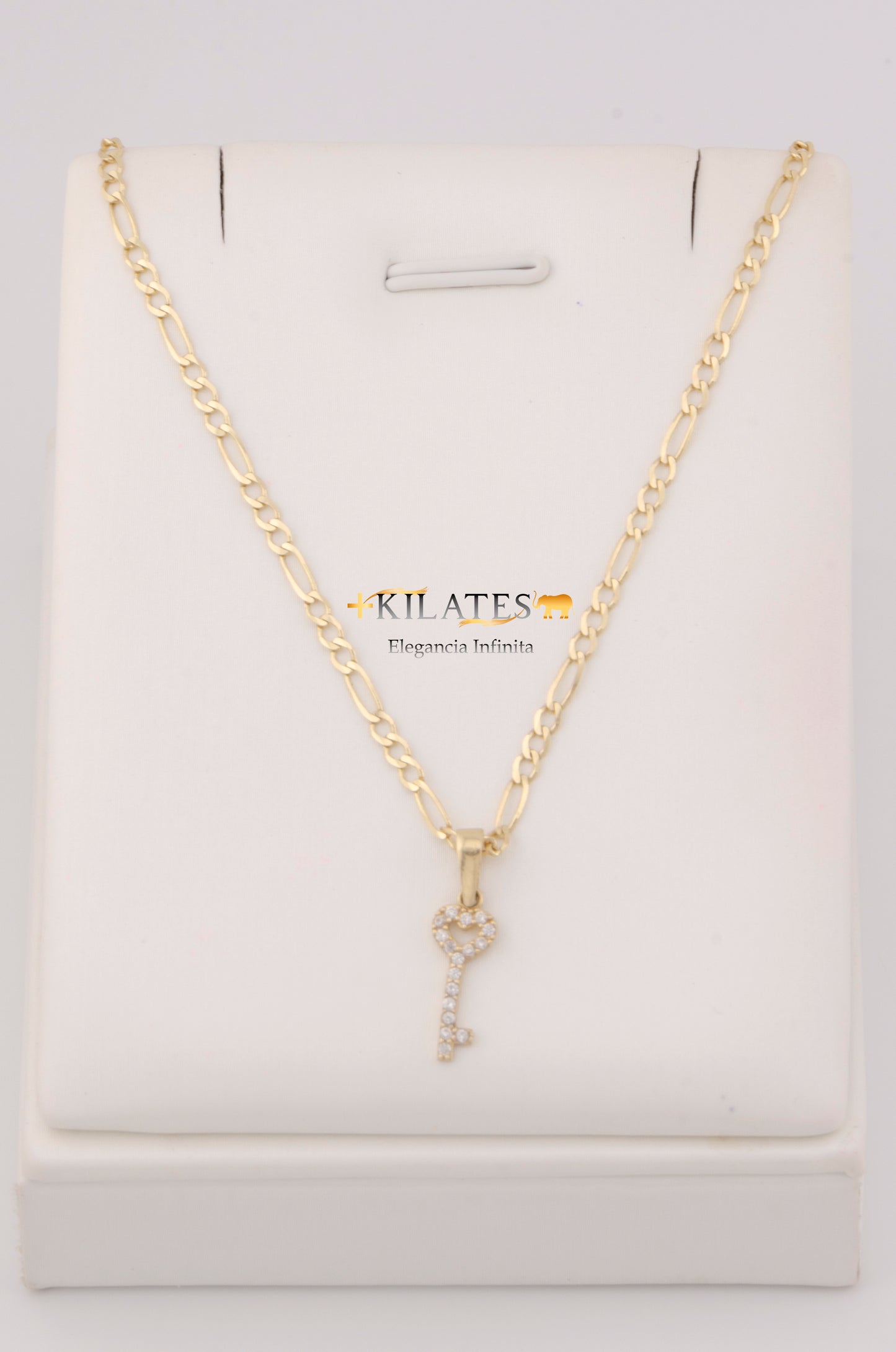 "CADENA DE 50CM PARA ADULTO ESTILO 3+1 SOLIDA CON DIJE DE LLAVE CON ZIRCONIA BLANCA. ORO 10K #775-3287"