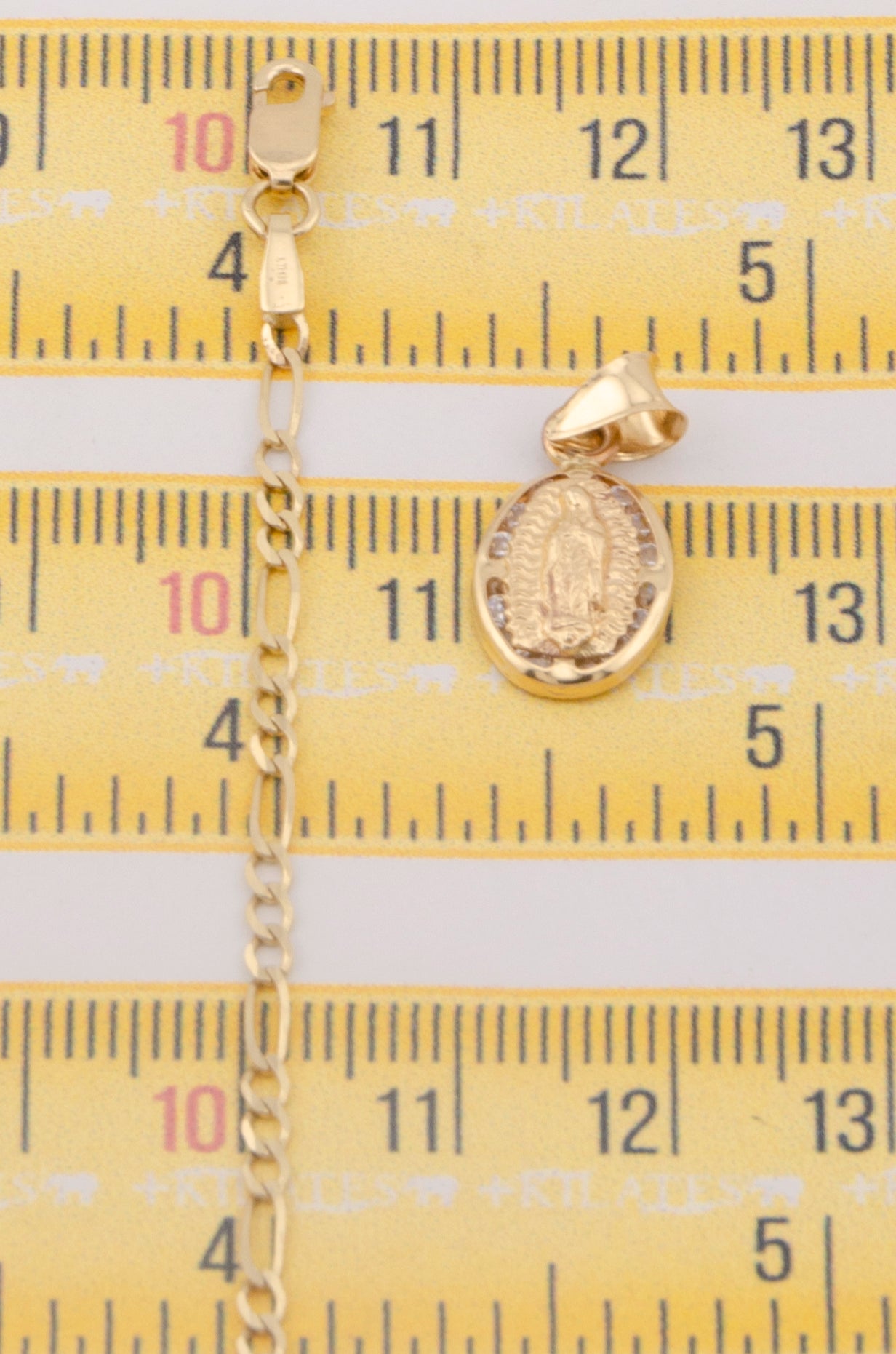 "CADENA DE 50CM PARA ADULTO ESTILO 3+1 SOLIDA CON DIJE OVALADO DE LA VIRGEN . ORO 10K #775-3253"