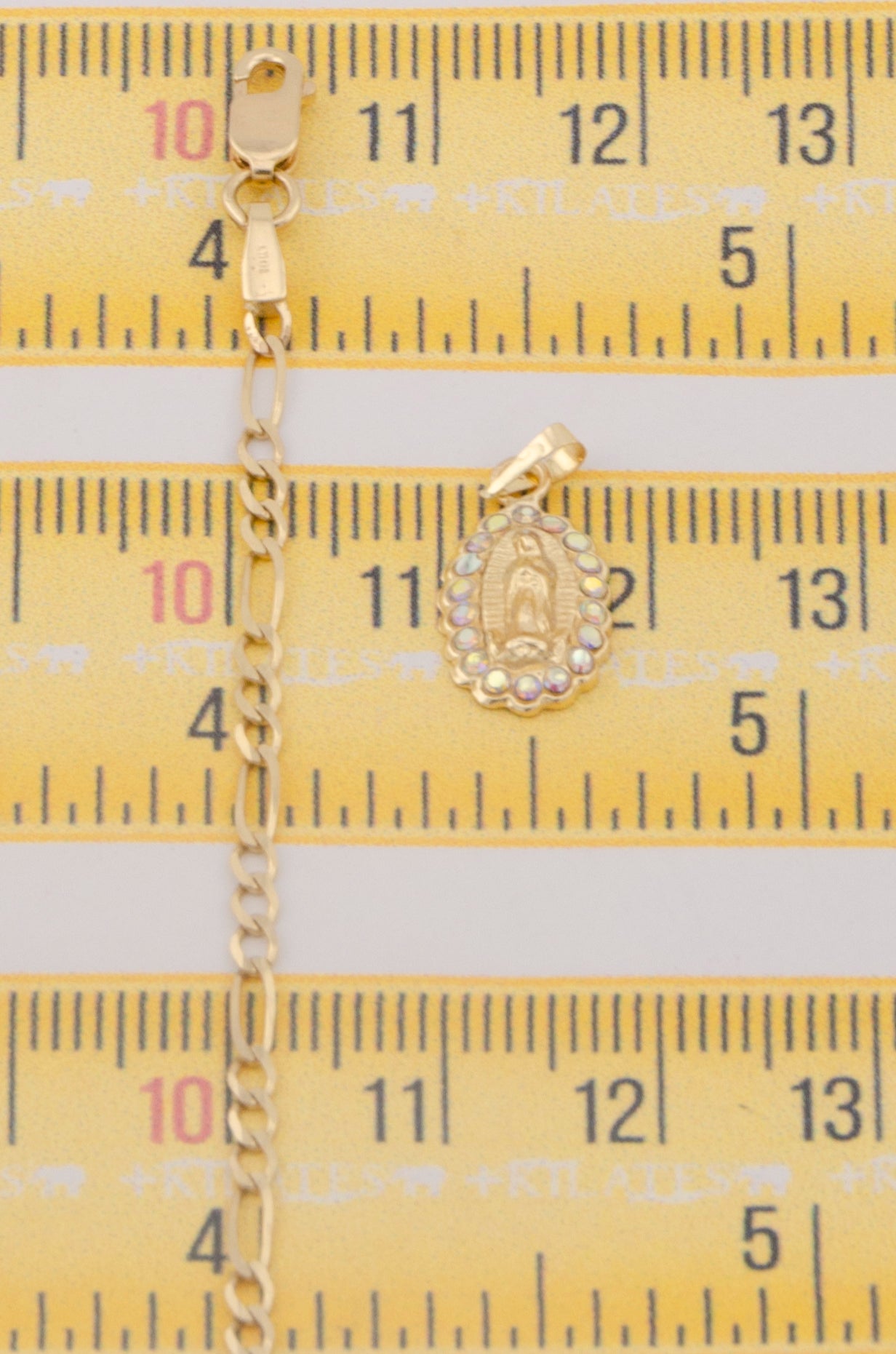 "CADENA DE 50CM PARA ADULTO ESTILO 3+1 SOLIDA CON DIJE DE LA VIRGEN CON ZIRCONIA TORNASOL . ORO 10K #775-3251"