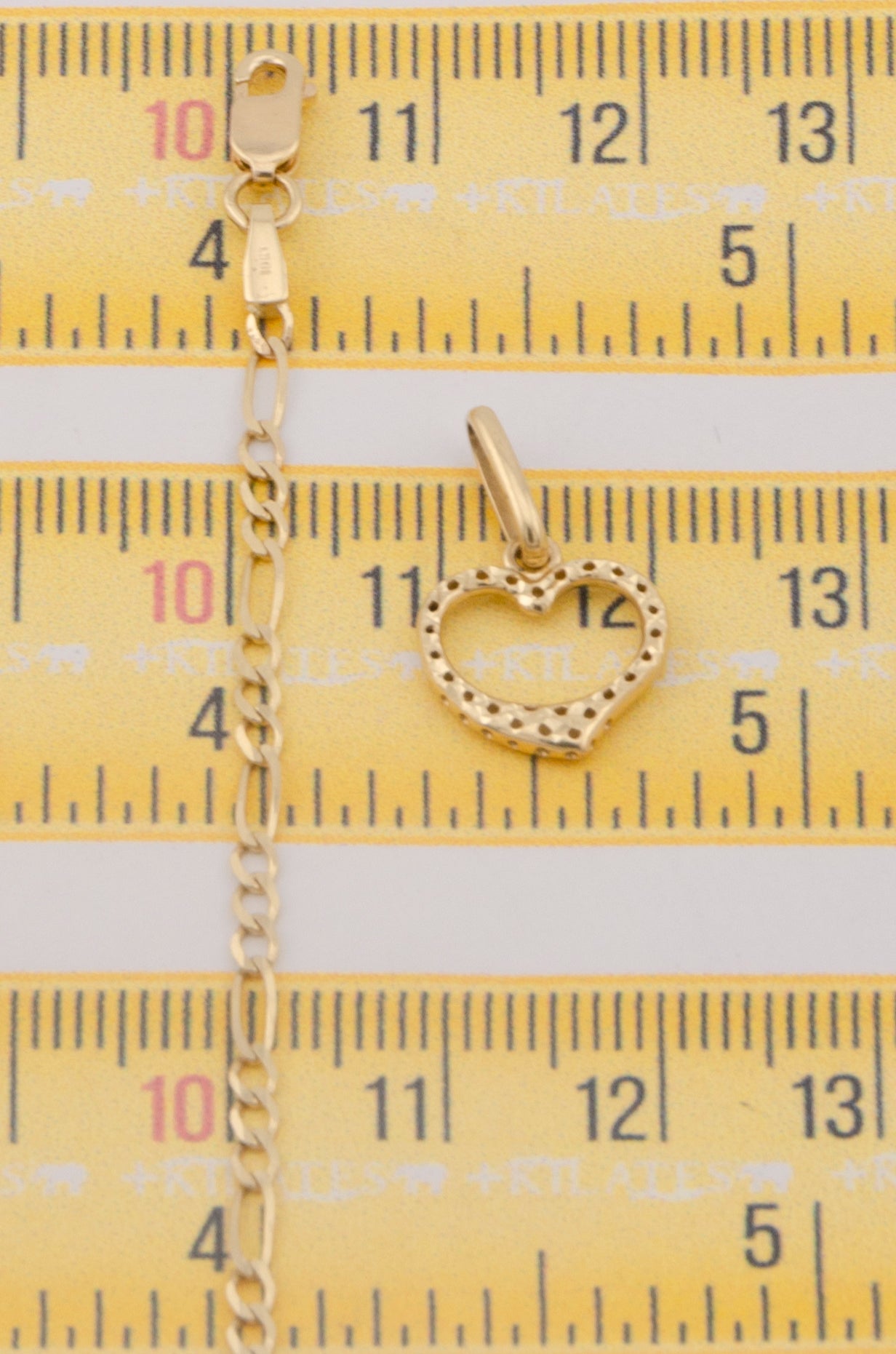 "CADENA DE 50CM PARA ADULTO ESTILO 3+1 SOLIDA CON DIJE DE CORAZON DORADO. ORO 10K #775-3271"