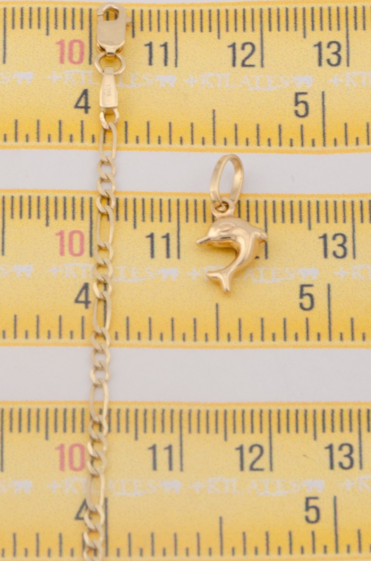 "CADENA DE 50CM PARA ADULTO ESTILO 3+1 SOLIDA CON DIJE DE DELFIN PEQUEÑO . ORO 10K #775-3265"