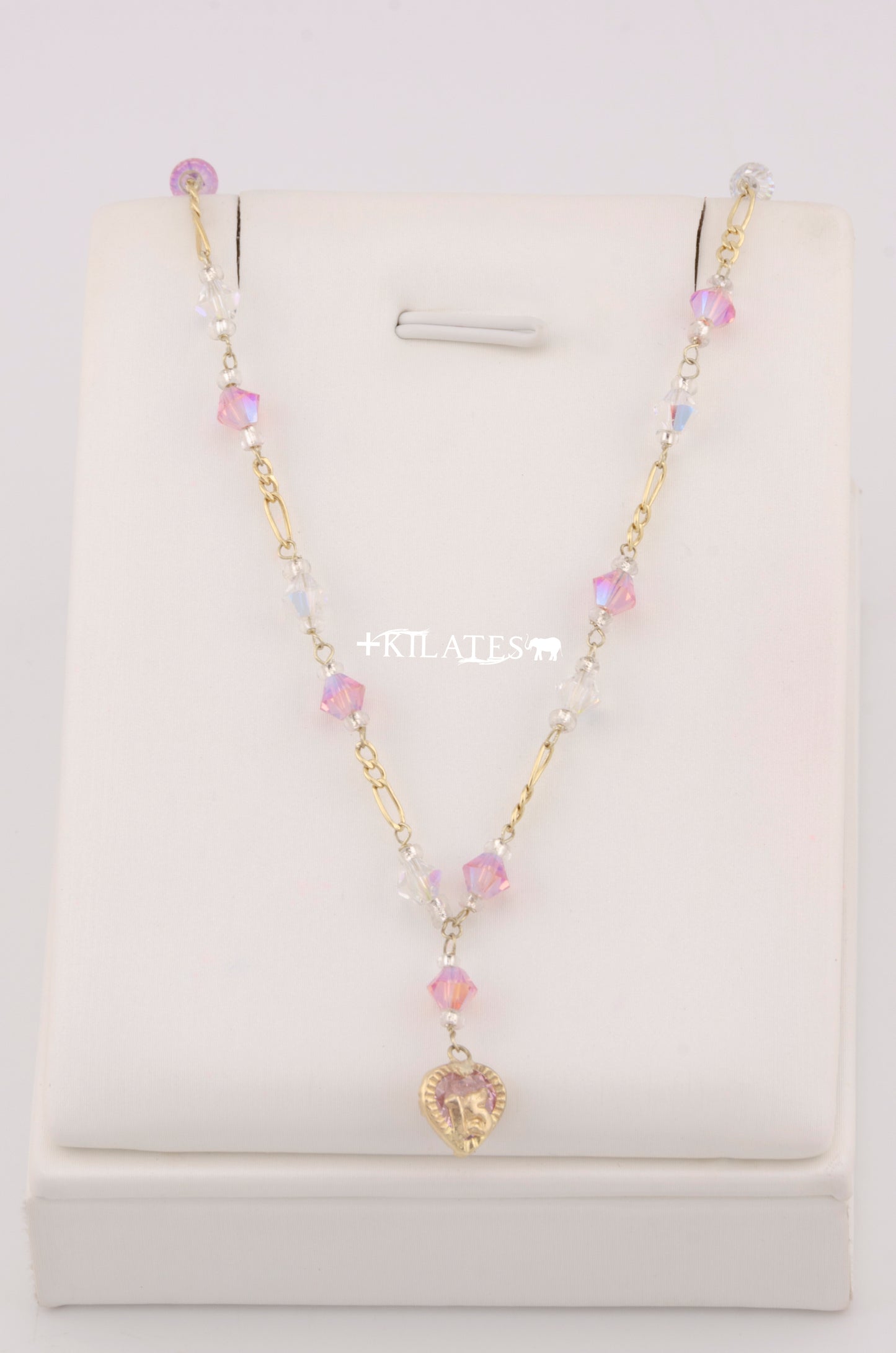 CADENA DE 47 CM PARA 15 AÑOS CON CRISTALES SWAROSKY ROSADOS Y BLANCOS. ORO 10K #775-3341