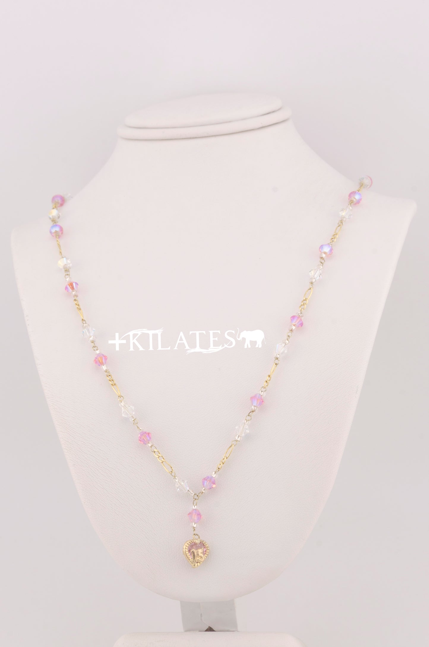 CADENA DE 47 CM PARA 15 AÑOS CON CRISTALES SWAROSKY ROSADOS Y BLANCOS. ORO 10K #775-3341