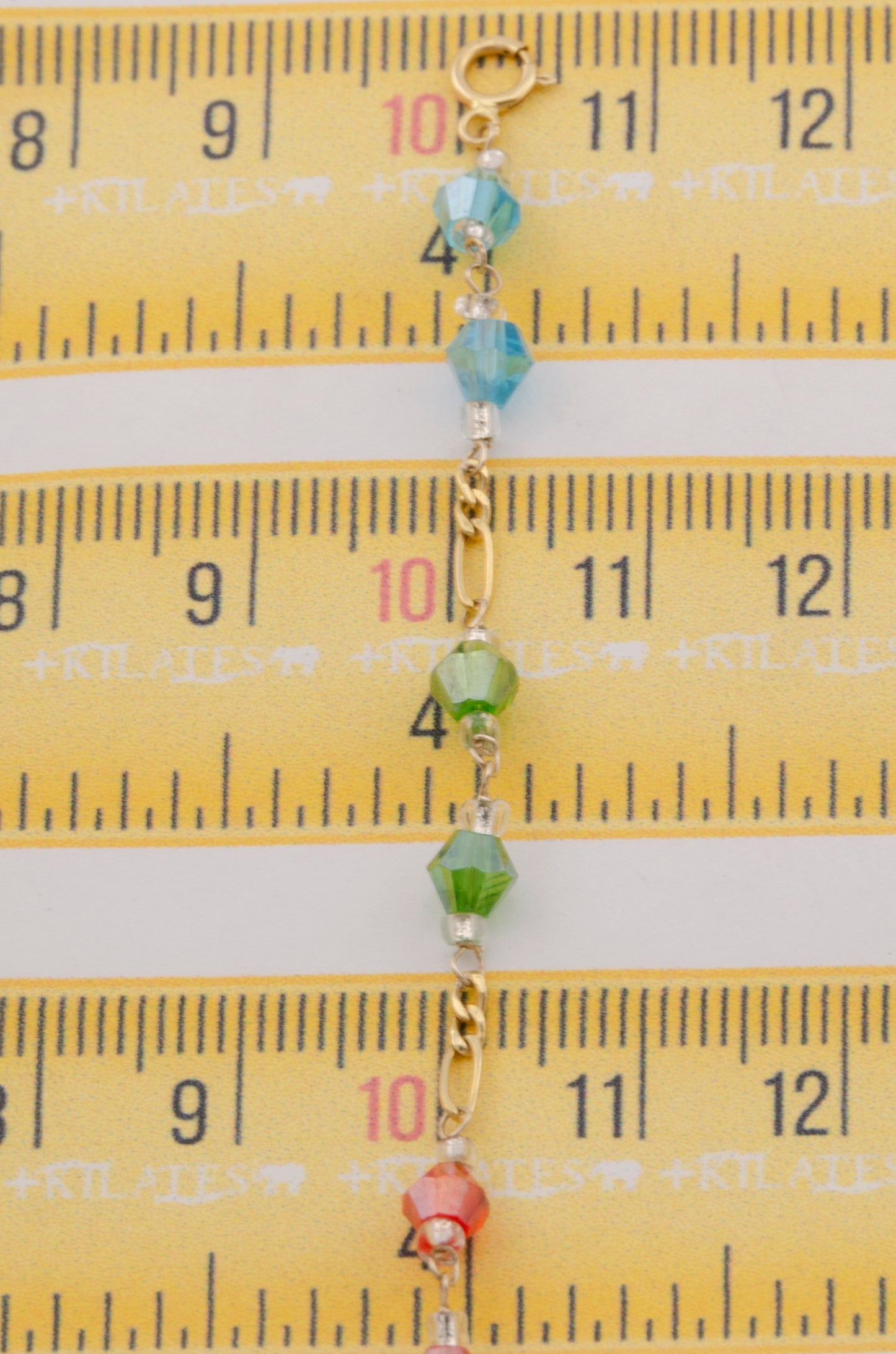 "PULSERA CRISTALES SWAROSKY DE COLORES. ORO 10K #775-3330"