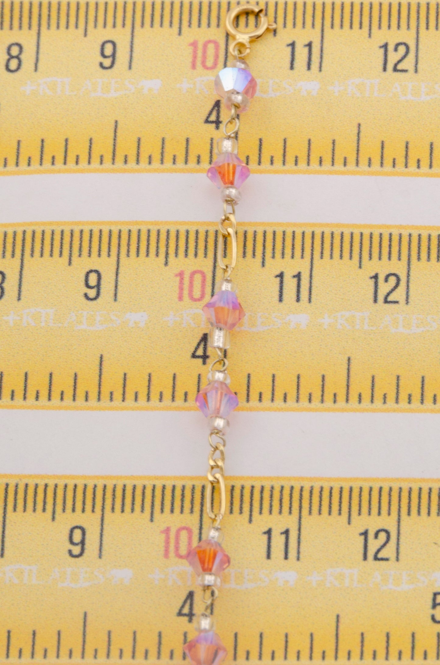 "PULSERA CRISTALES SWAROSKY ROSADOS. ORO 10K #775-3334"