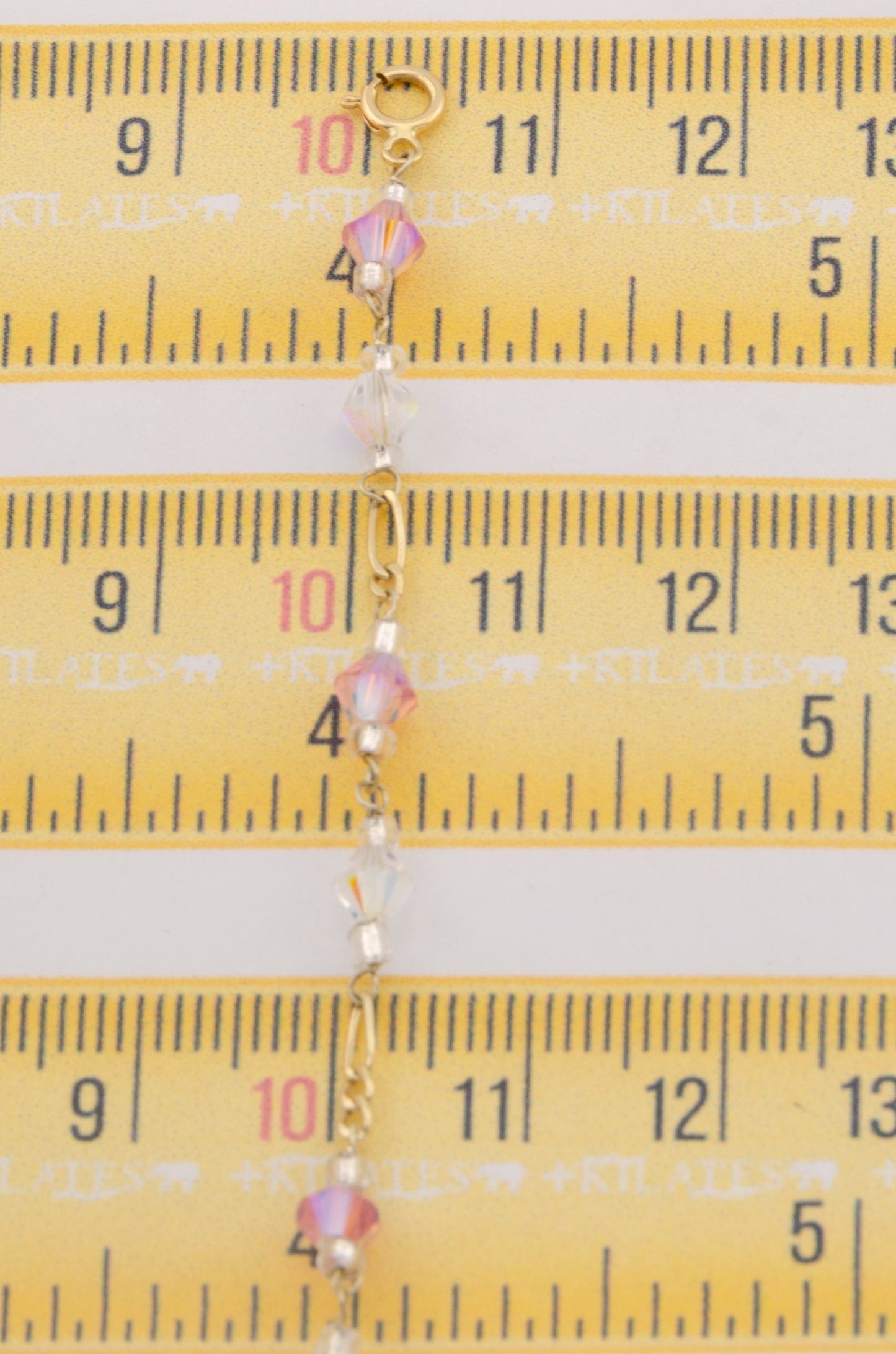 CADENA DE 47 CM PARA 15 AÑOS CON CRISTALES SWAROSKY ROSADOS Y BLANCOS. ORO 10K #775-3341
