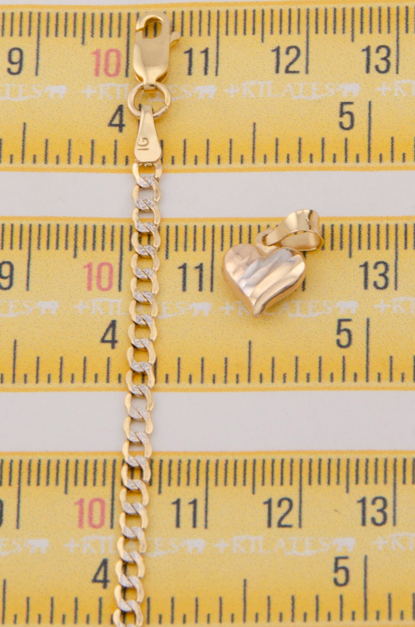 "CADENA DE 40CM PARA NIÑ@ ESTILO CUBANA DIAMANTADA CON DIJE DE CORAZON 3 TONOS. ORO 10K #775-3380"