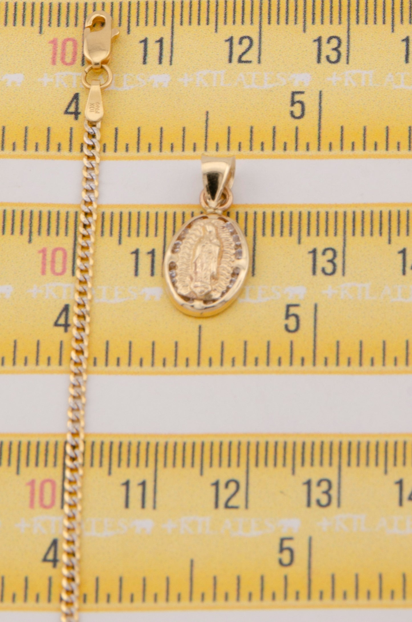 "CADENA DE 40CM PARA NIÑ@ ESTILO CUBANA DIAMANTADA SOLIDA CON DIJE OVALADO DE LA VIRGEN. ORO 10K #775-3361"