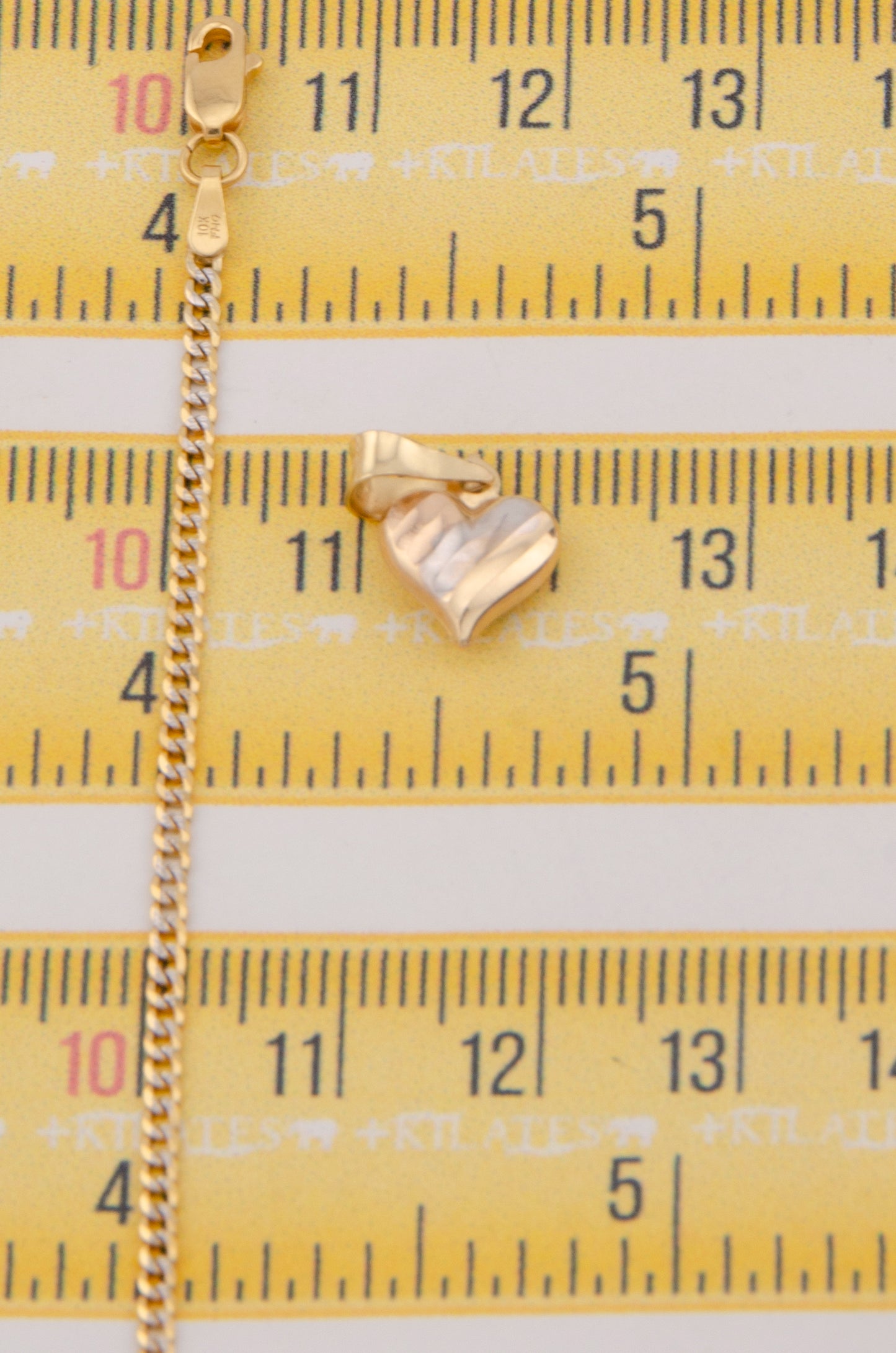 "CADENA DE 40CM PARA NIÑ@ ESTILO CUBANA DIAMANTADA SOLIDA CON DIJE CORAZON 3 TONOS PEQUEÑO. ORO 10K #775-3369"
