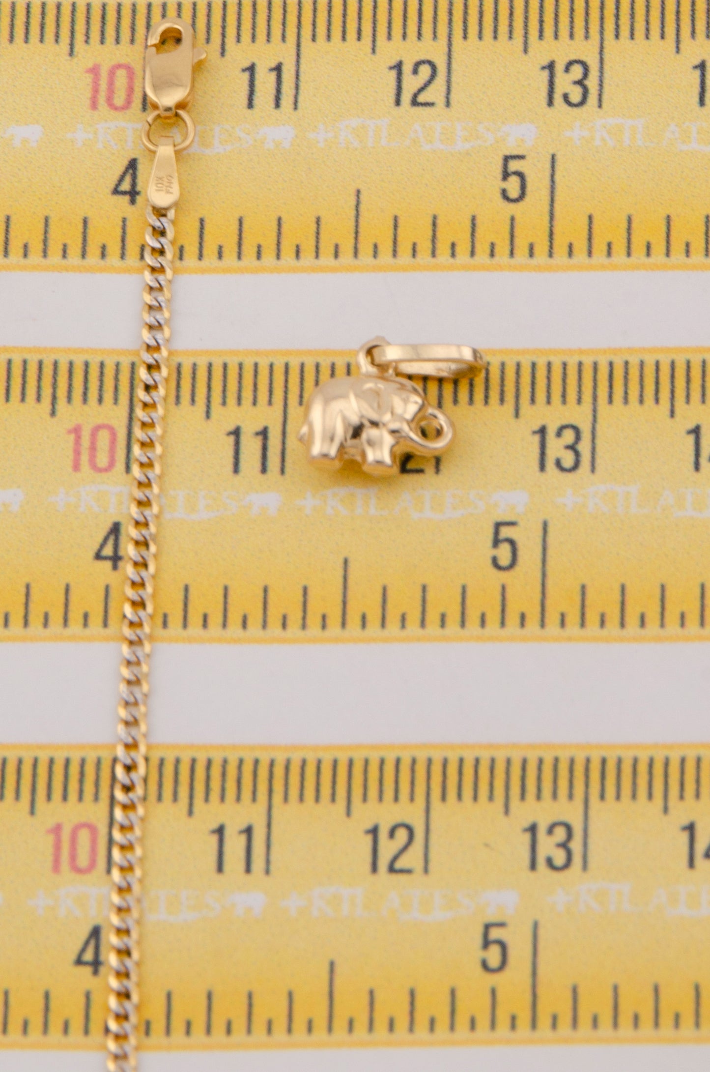 "CADENA DE 40CM PARA NIÑ@ ESTILO CUBANA DIAMANTADA SOLIDA CON DIJE DE ELEFANTE. ORO 10K #775-3370"
