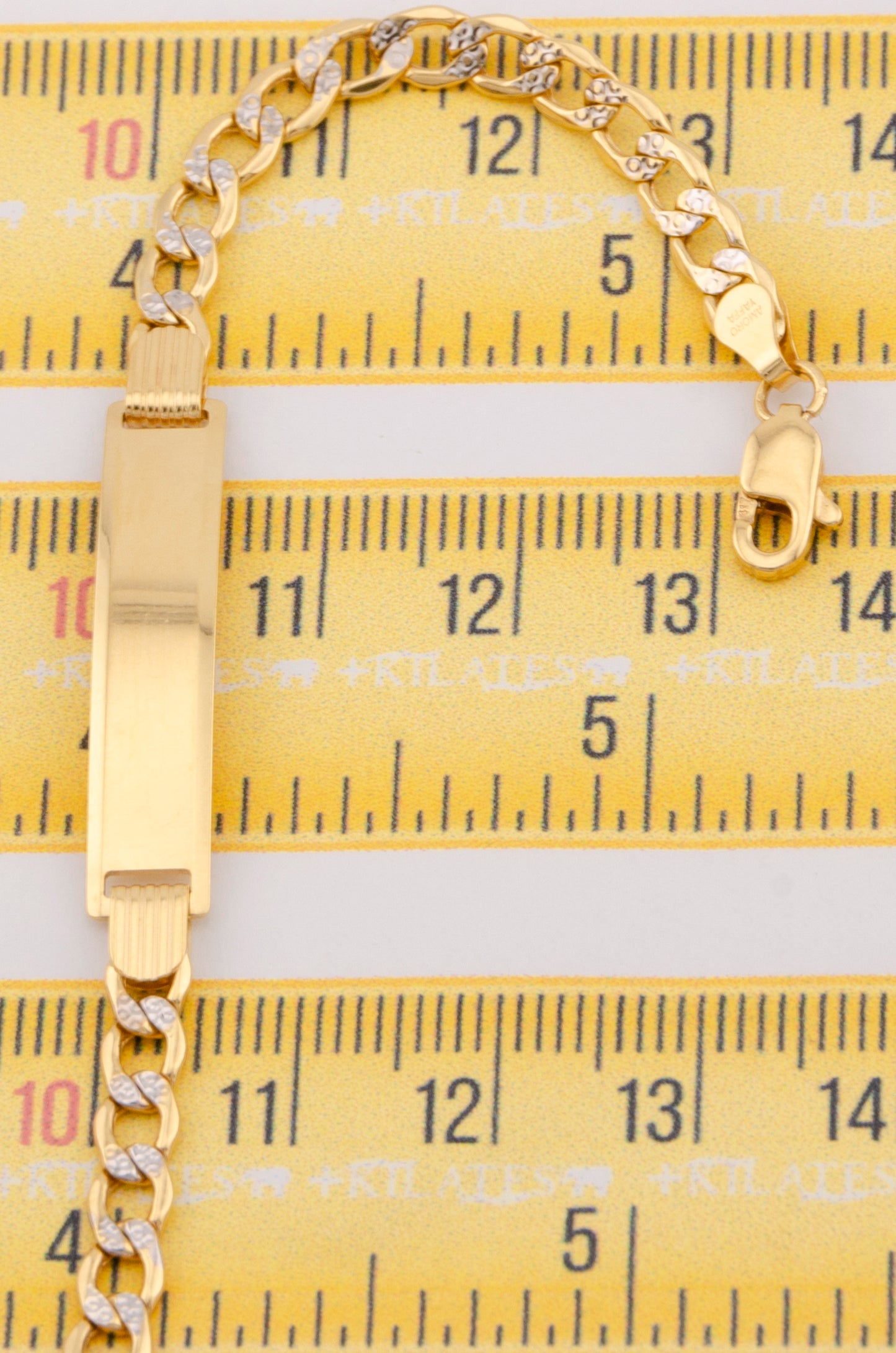 "PULSERA PARA NIÑ0 DE 15.5CM ESTILO CUBANA DIAMANTADA CON PLACA. ORO 10K #775-3452"