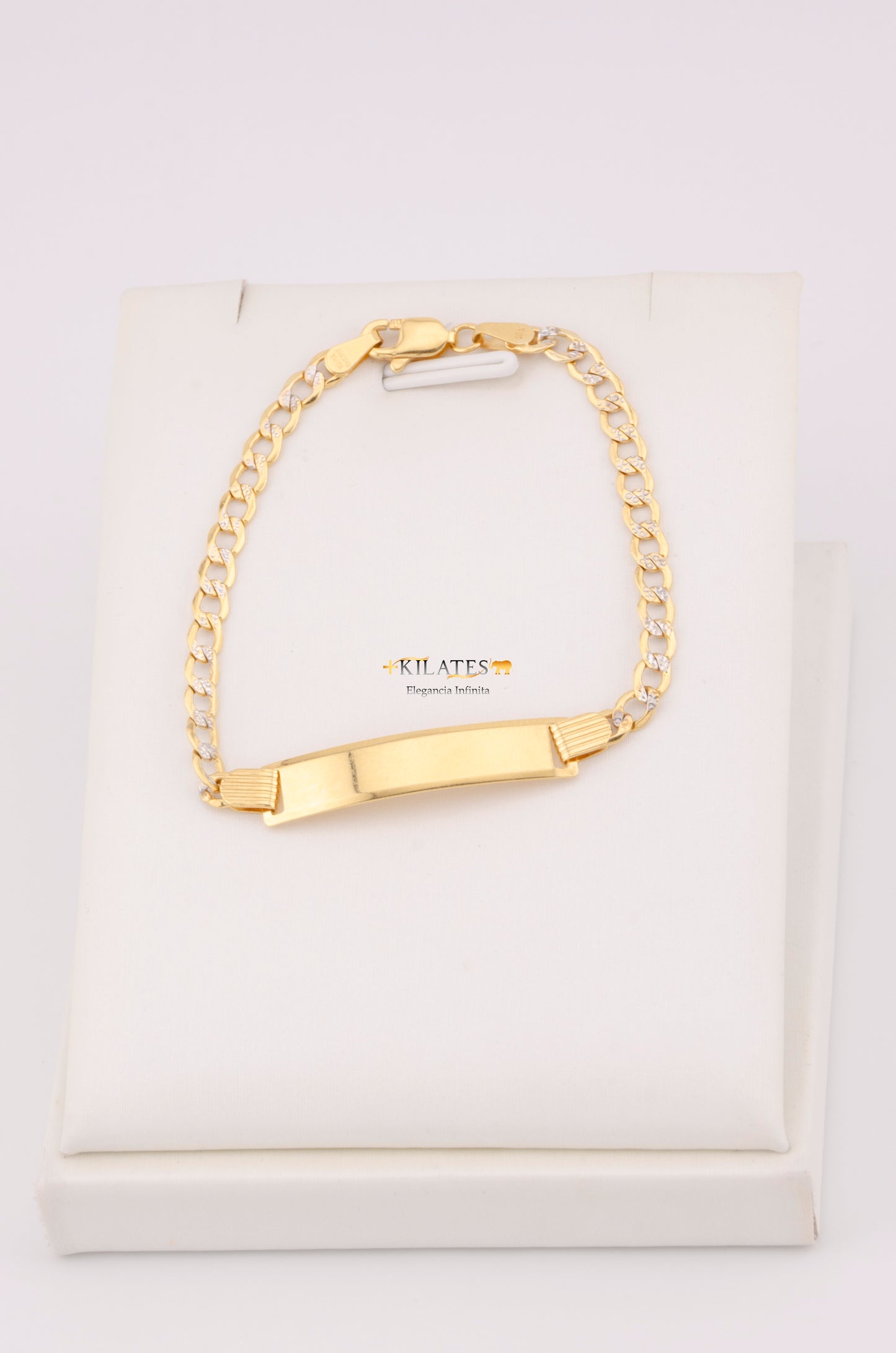 "PULSERA PARA NIÑ0 DE 15.5CM ESTILO CUBANA DIAMANTADA CON PLACA. ORO 10K #775-3451"