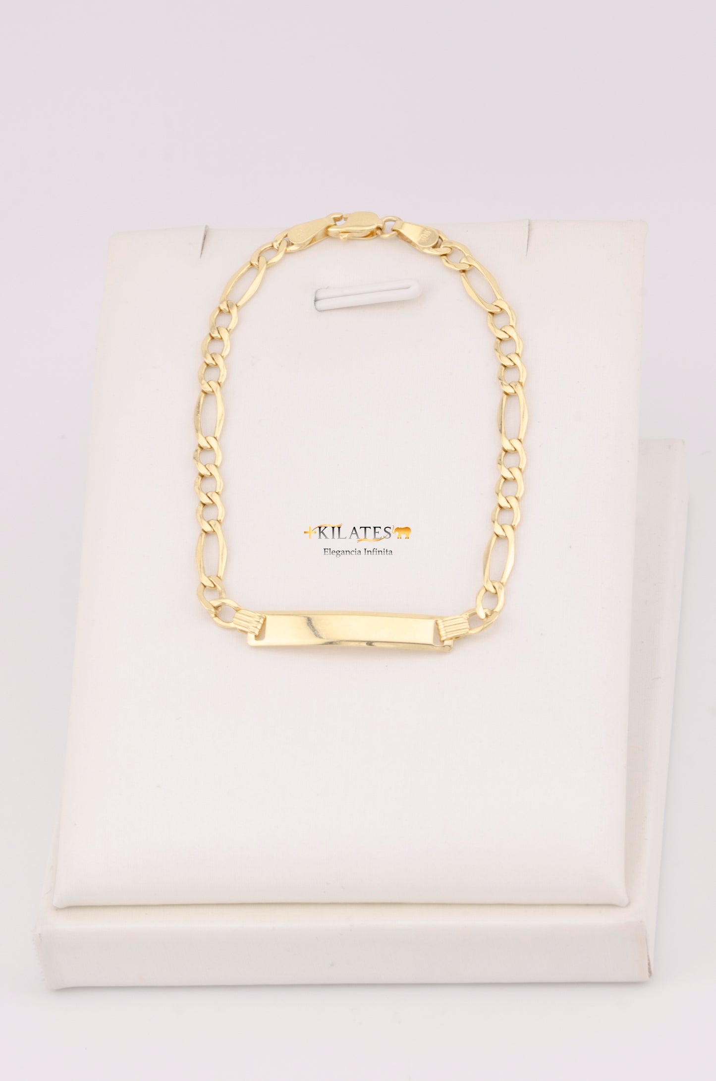 "PULSERA PARA NIÑ0 DE 15.5CM ESTILO CUBANA DIAMANTADA CON PLACA. ORO 10K #775-3453"