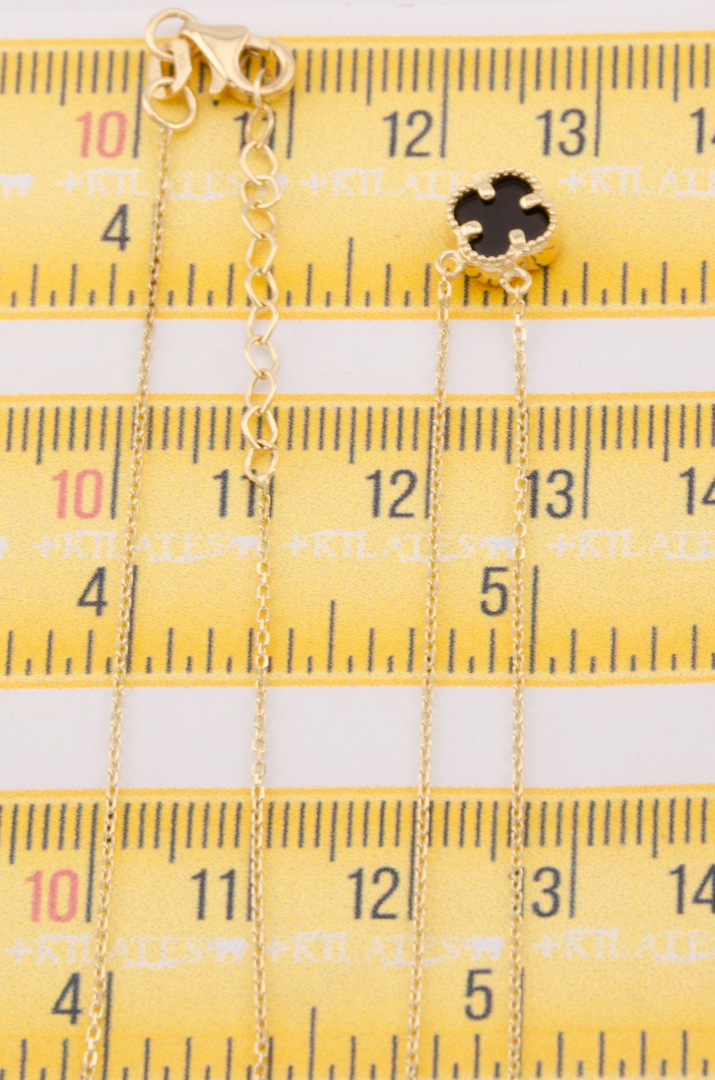 "GARGANTILLA ESTILO TREBOL NEGRO AJUSTABLE DE 42.5CM-46CM PARA ADULTO. ORO 10K #775-3461"