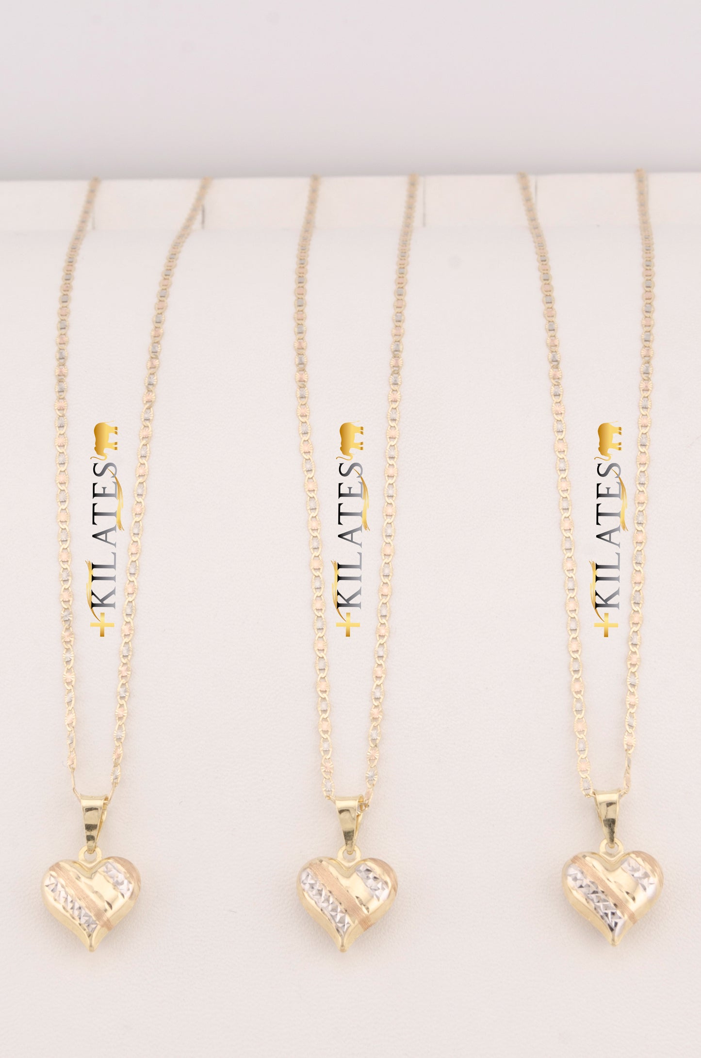 "CADENA DE 50CM PARA ADULTO ESTILO 3 OROS CON DIJE DE CORAZON 3 TONOS GRANDE. ORO 10K #775-3462"
