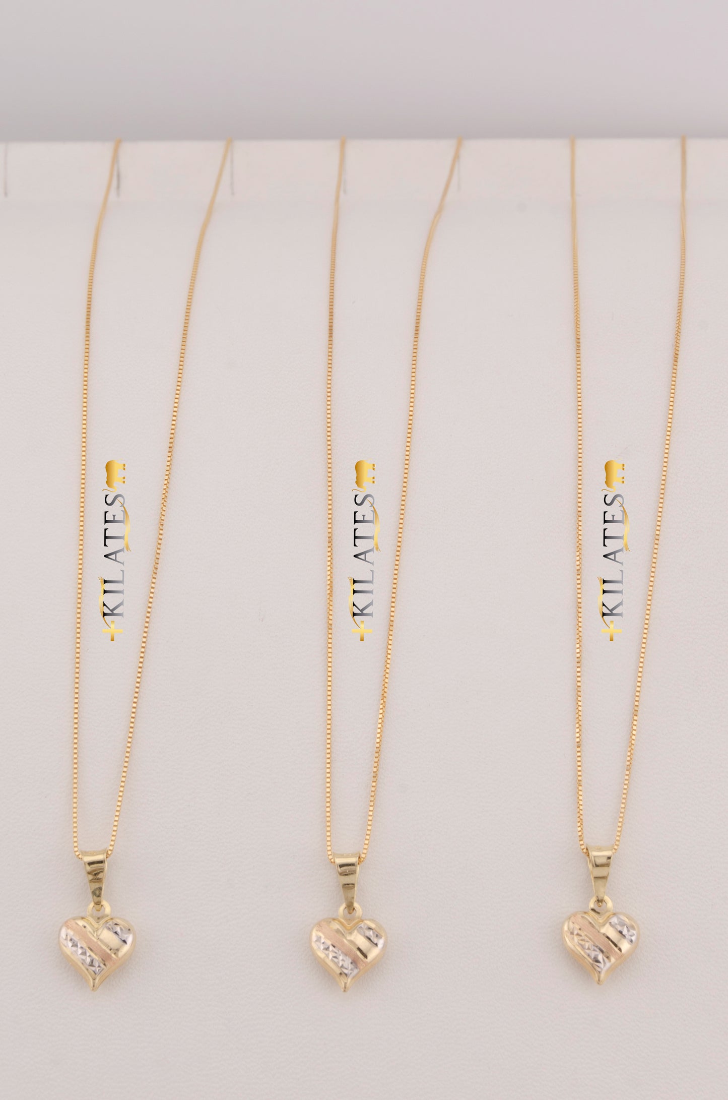 "CADENA DE 50CM PARA ADULTO ESTILO FINITA CON DIJE DE CORAZON 3 TONOS PEQUEÑO. ORO 10K #775-3478"