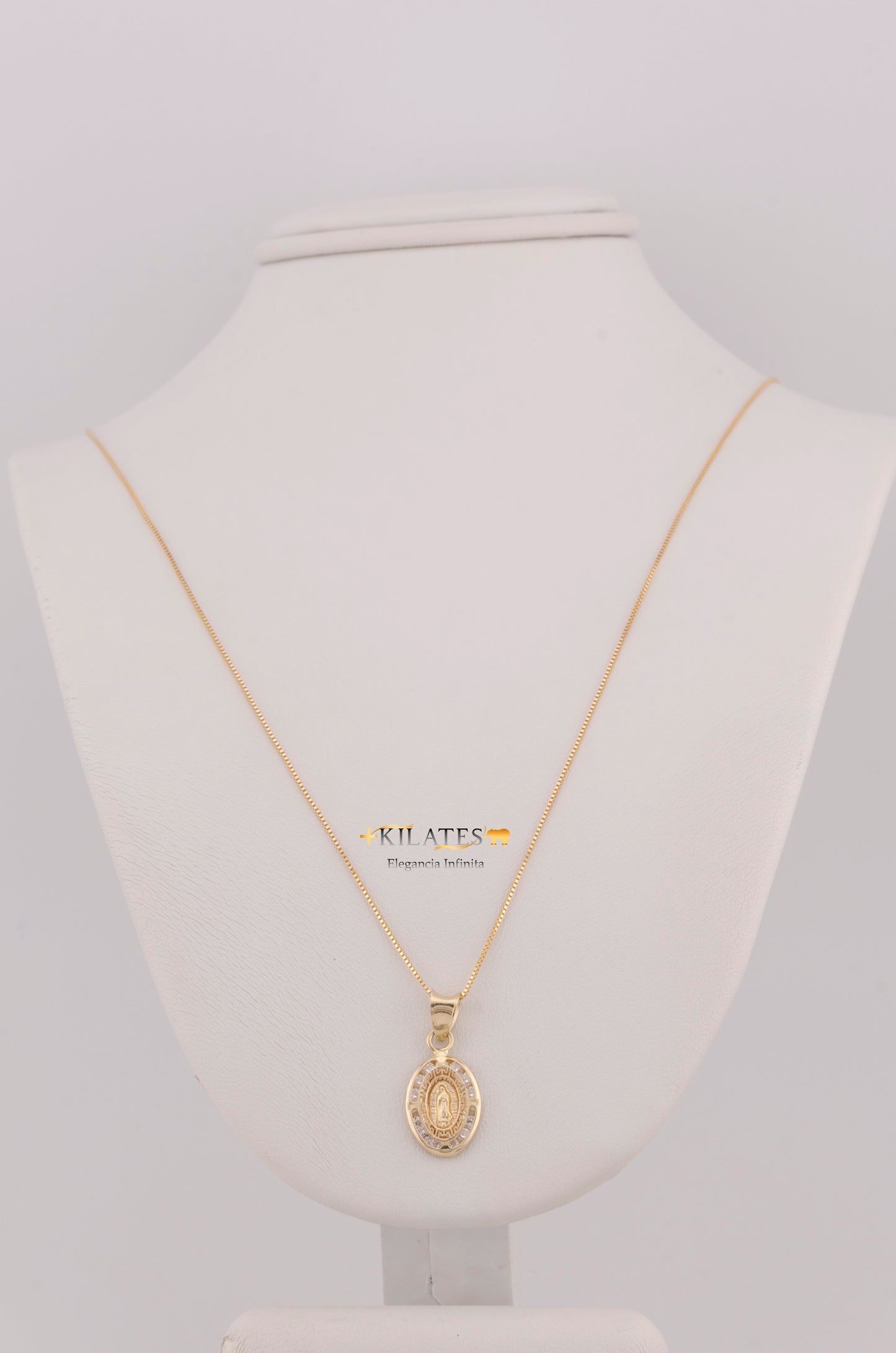 "CADENA DE 50CM PARA ADULTO ESTILO FINITA CON DIJE OVALADO PEQUEÑO DE LA VIRGEN. ORO 10K #775-3483"