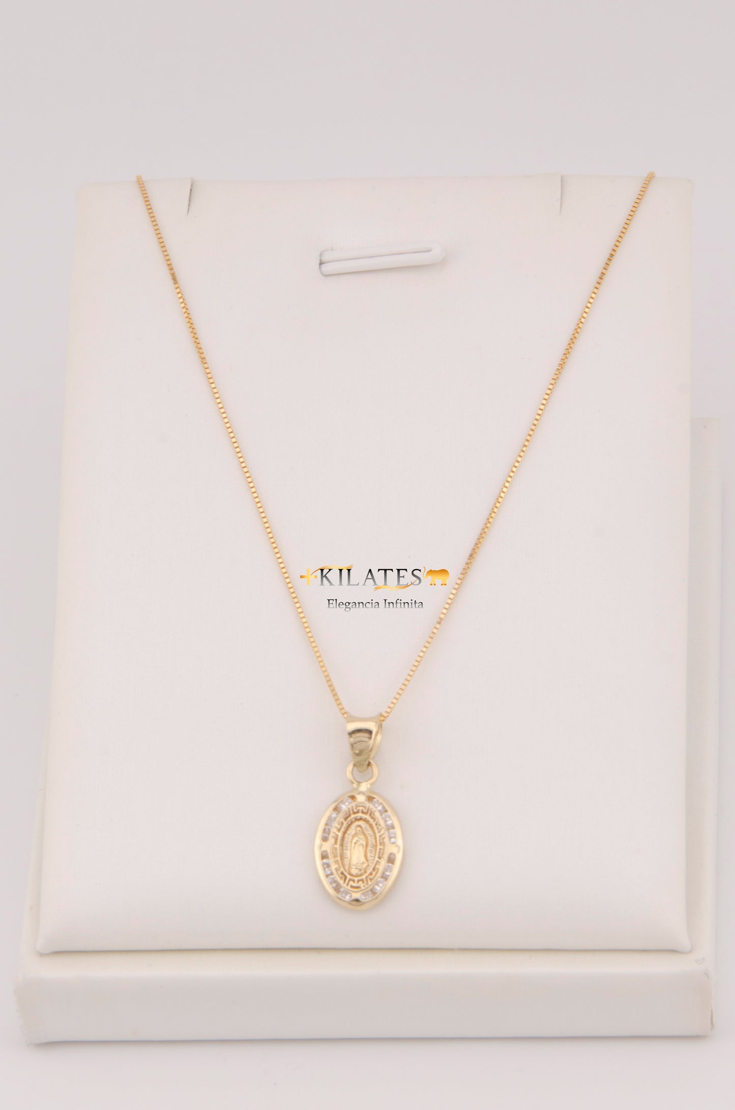 "CADENA DE 50CM PARA ADULTO ESTILO FINITA CON DIJE OVALADO PEQUEÑO DE LA VIRGEN. ORO 10K #775-3483"