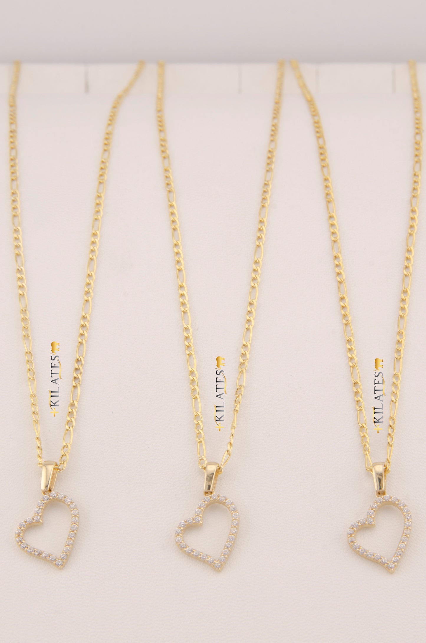 "CADENA DE 50CM PARA ADULTO ESTILO 3+1 CON DIJE DE CORAZON CON ZIRCONIA BLANCA. ORO 10K #775-3489"