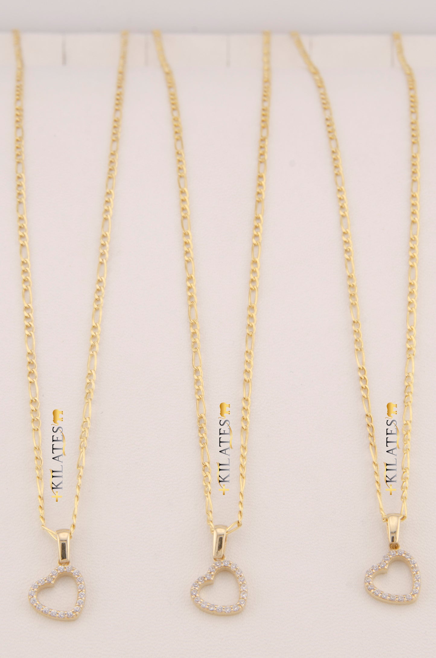 "CADENA DE 50CM PARA ADULTO ESTILO 3+1 CON DIJE DE CORAZON CON ZIRCONIA BLANCA. ORO 10K #775-3490"