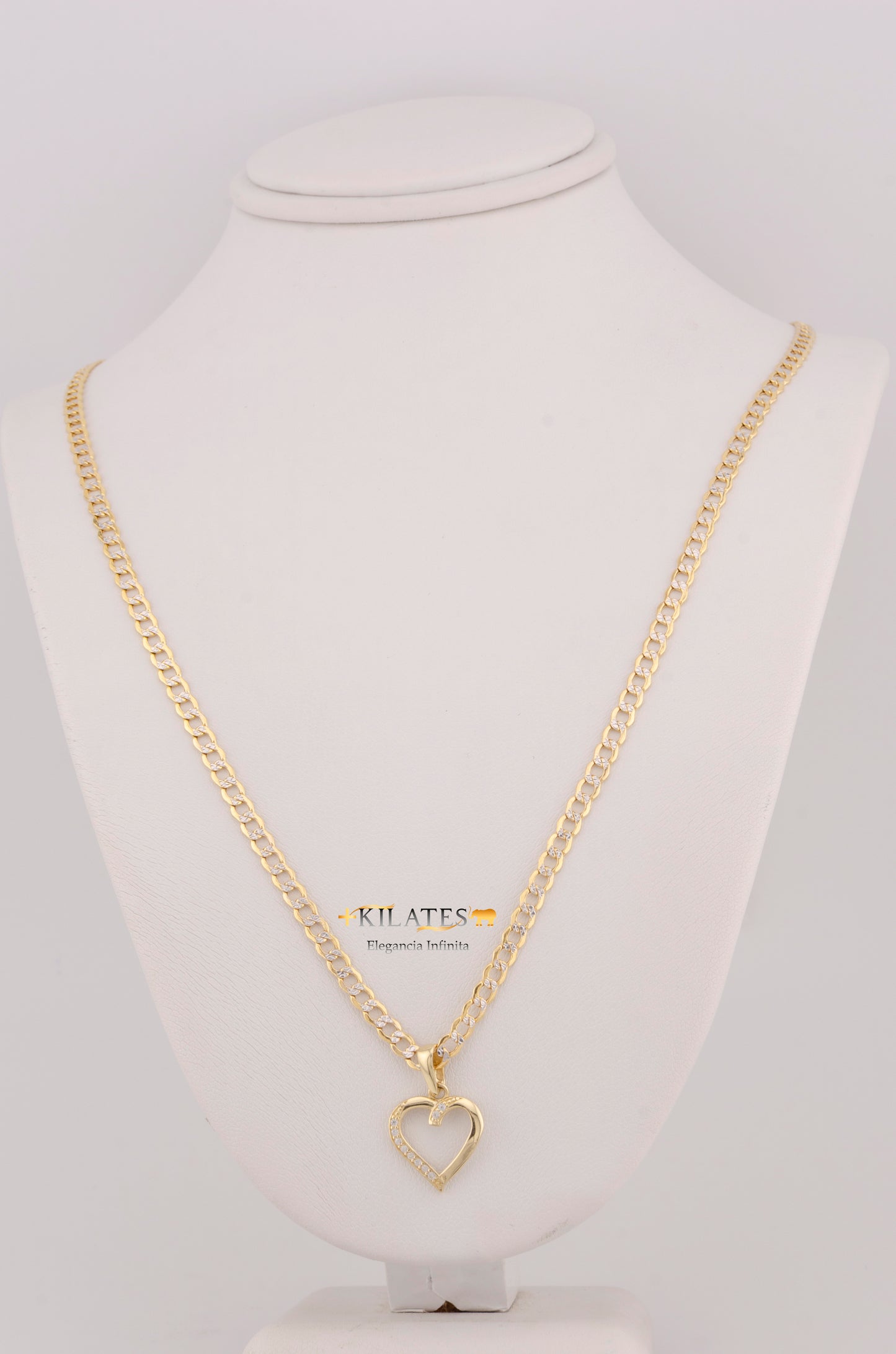 "CADENA DE 50CM PARA DAMA ESTILO CUBANA DIAMANTADA CON DIJE DE CORAZON CON ZIRCONIA BLANCA. ORO 10K #775-3511"