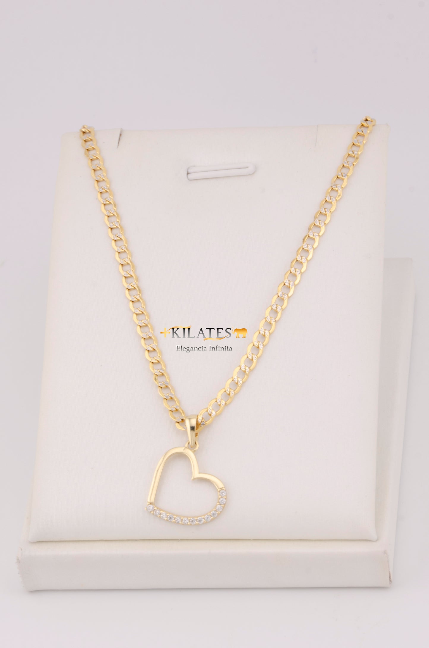 "CADENA DE 50CM PARA DAMA ESTILO CUBANA DIAMANTADA CON DIJE DE CORAZON CON ZIRCONIA BLANCA. ORO 10K #775-3514"