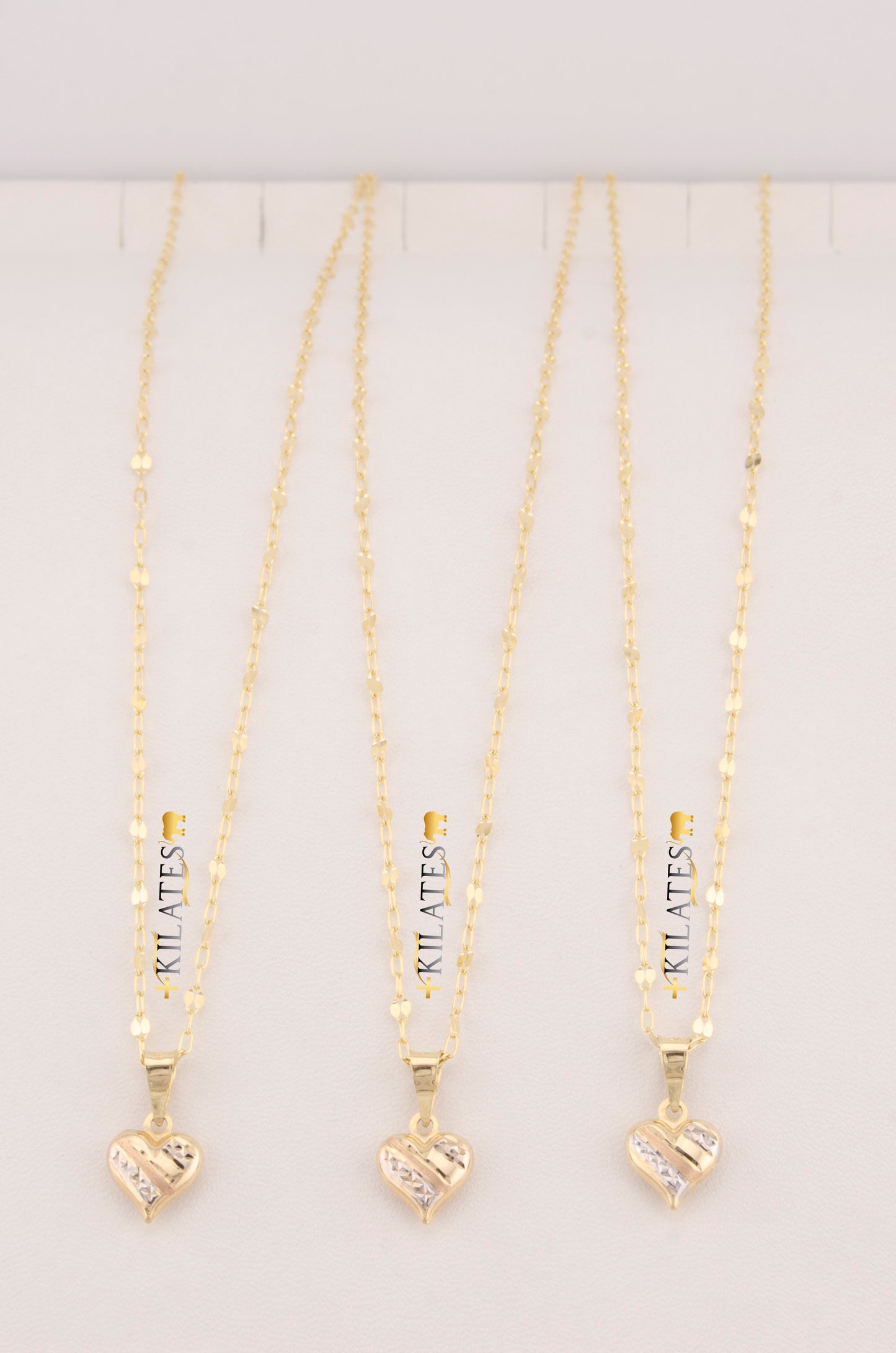 "CADENA DE 50CM PARA DAMA ESTILO LLUVIA CON DIJE DE CORAZON 3 TONOS PEQUEÑO. ORO 10K #775-3526"