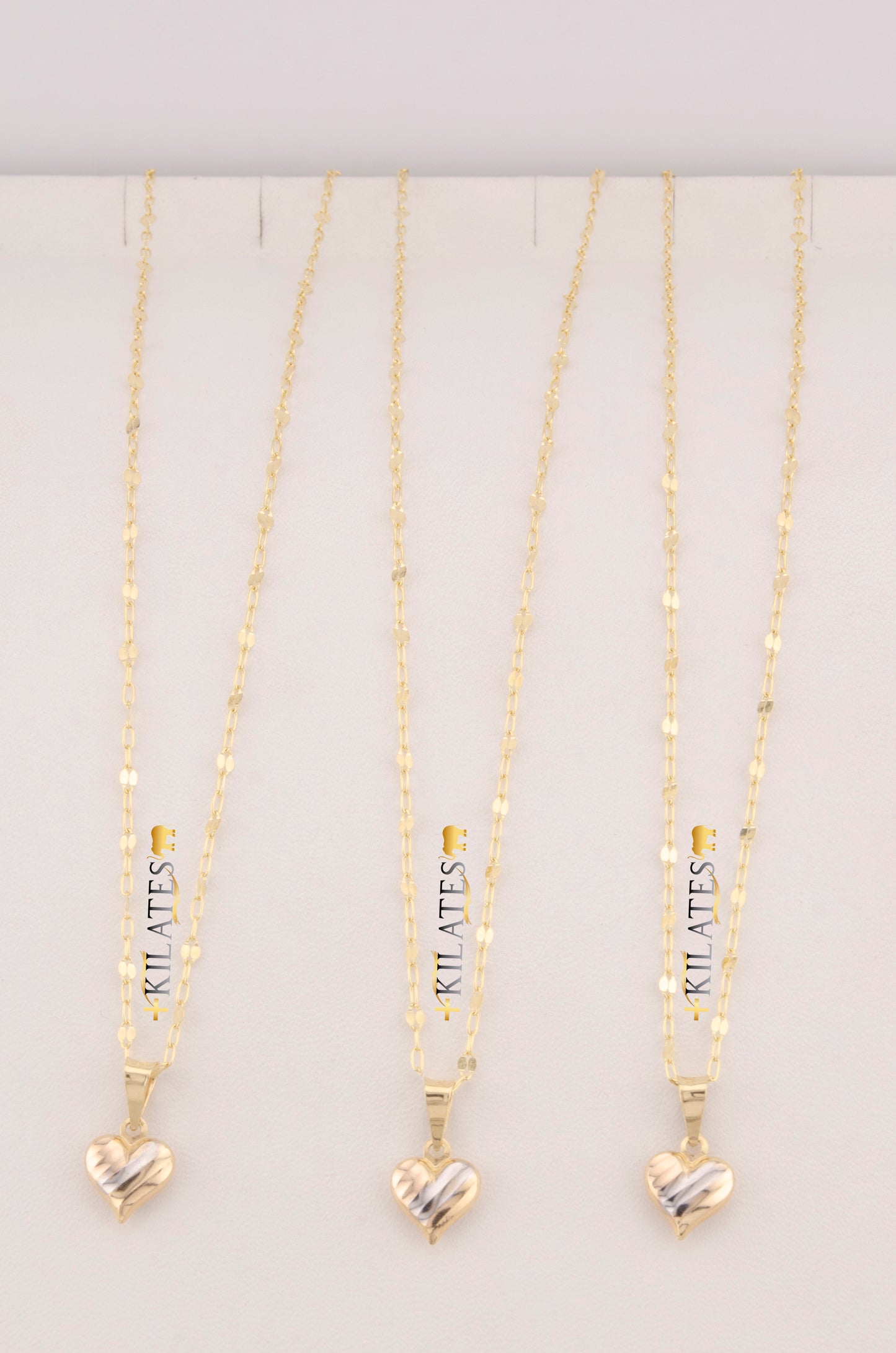 "CADENA DE 50CM PARA DAMA ESTILO LLUVIA CON DIJE DE CORAZON 3 TONOS PEQUEÑO. ORO 10K #775-3527"