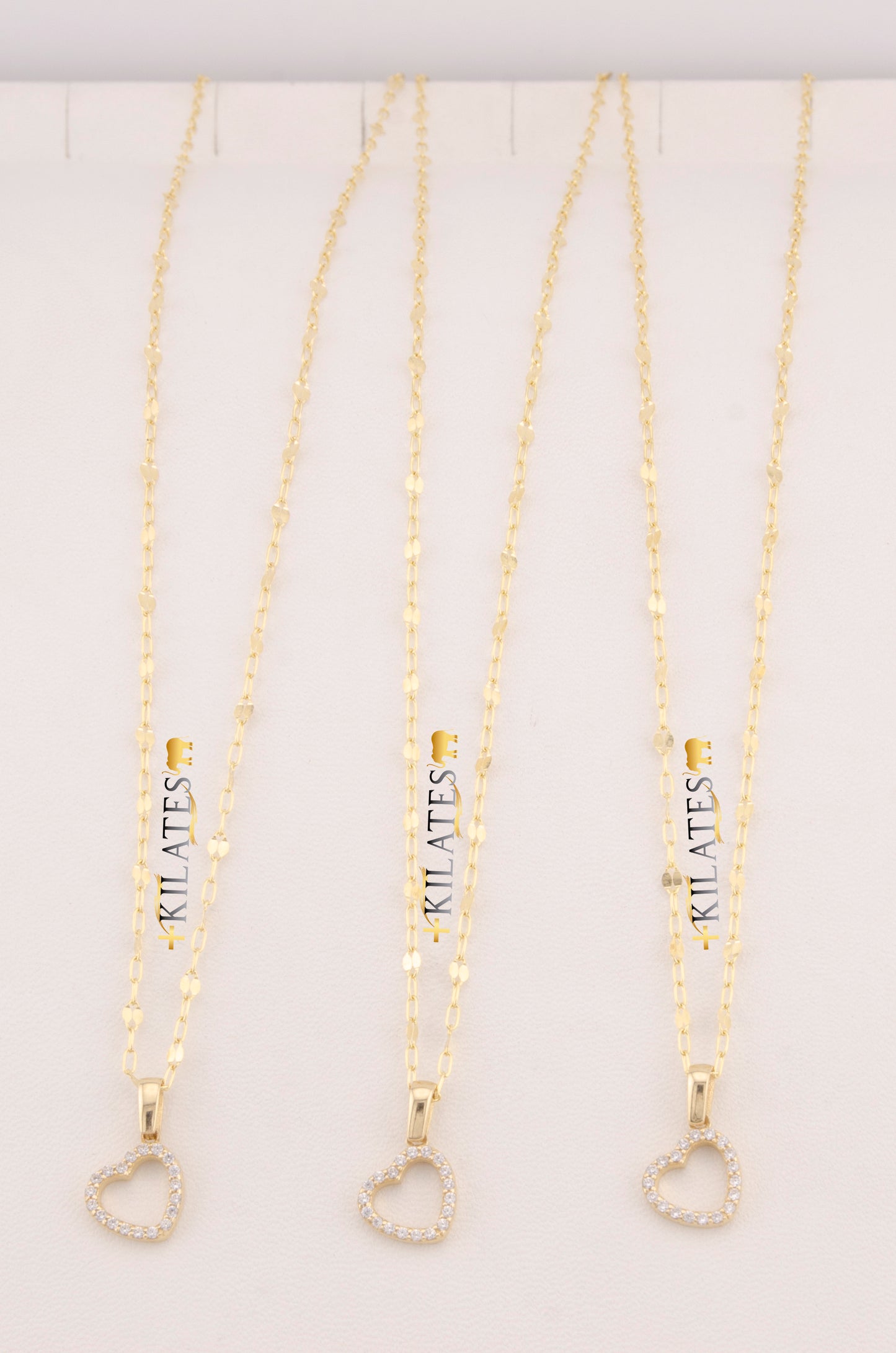 "CADENA DE 50CM PARA DAMA ESTILO LLUVIA CON DIJE DE CORAZON CON ZIRCONIA BLANCA. ORO 10K #775-3528"