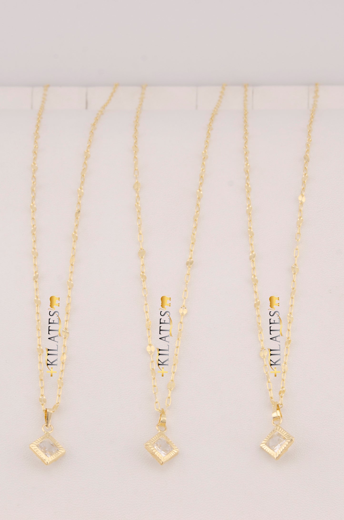 "CADENA DE 50CM PARA DAMA ESTILO LLUVIA CON DIJE CUADRADO CON ZIRCONIA BLANCA ORO 10K #775-3531"