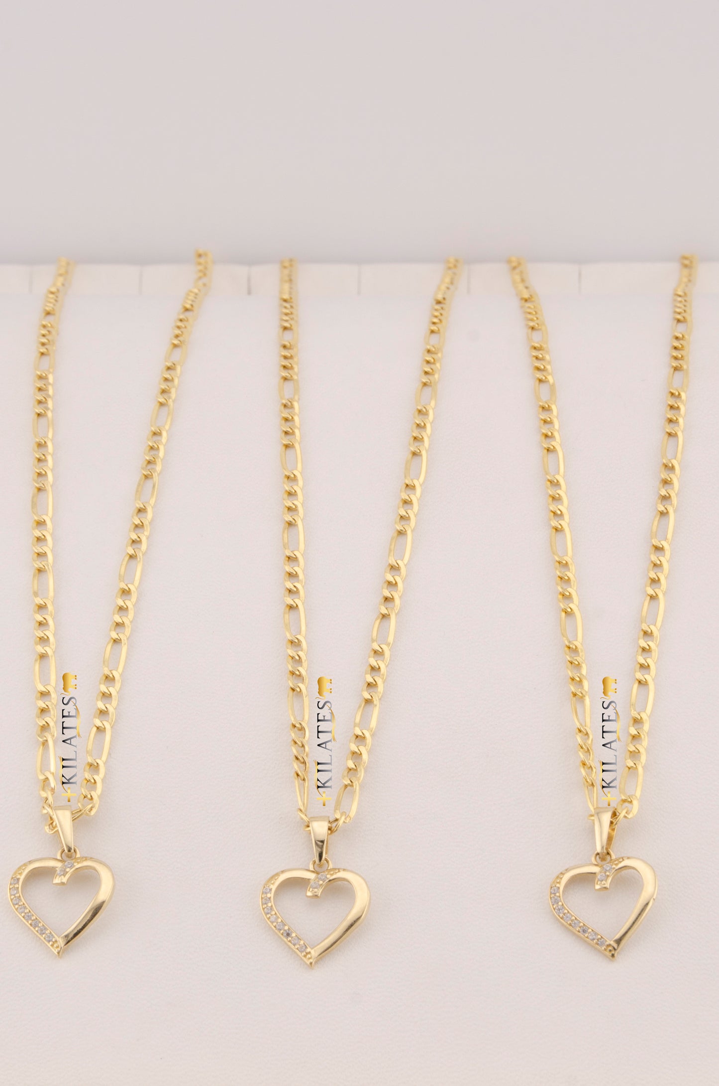 "CADENA DE 50CM PARA DAMA ESTILO 3+1 CON DIJE DE CORAZON CON PIEDRAS DE ZIRCONIA BLANCA . ORO 10K #775-3538"