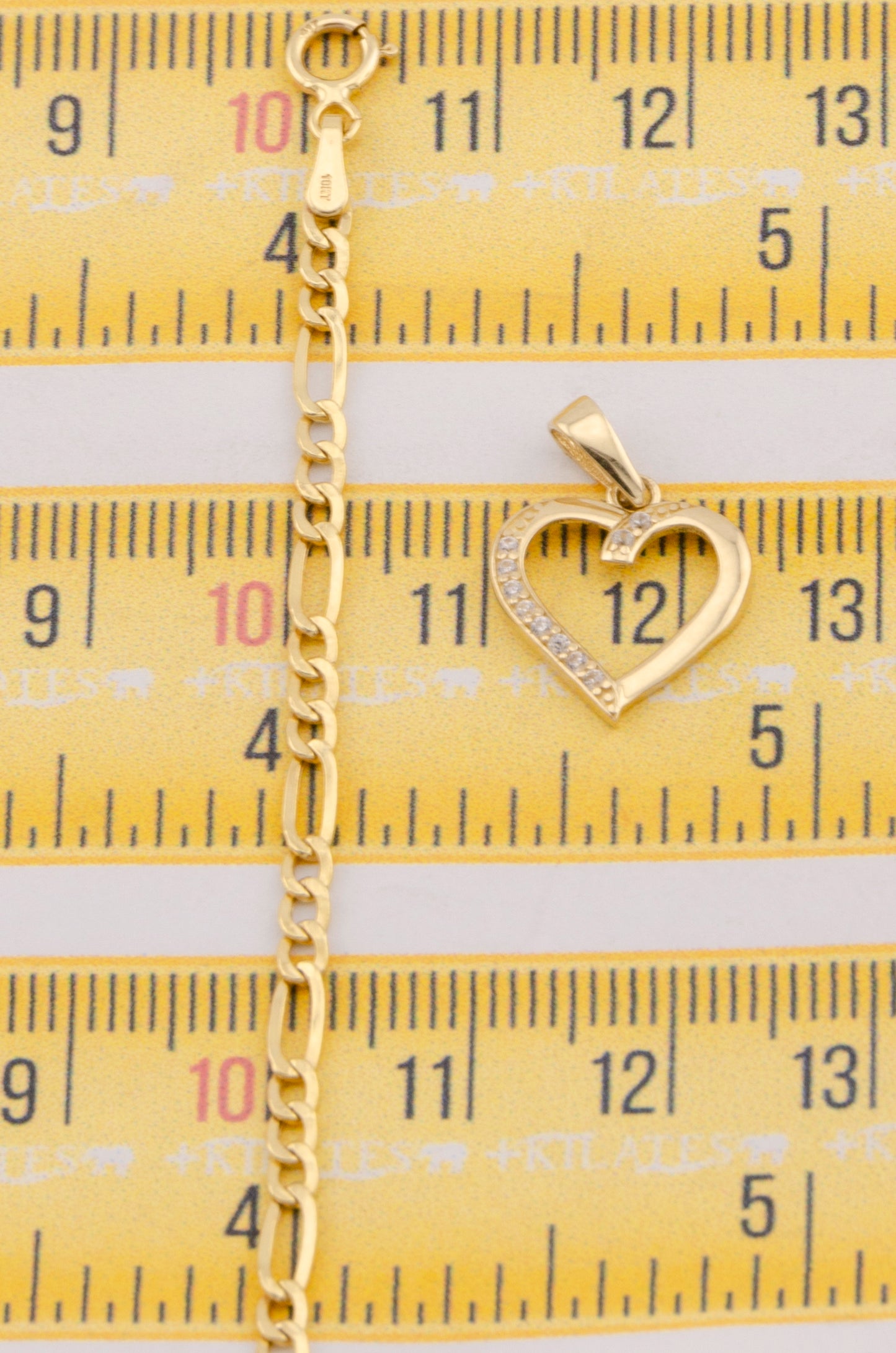 "CADENA DE 50CM PARA DAMA ESTILO 3+1 CON DIJE DE CORAZON CON PIEDRAS DE ZIRCONIA BLANCA . ORO 10K #775-3538"