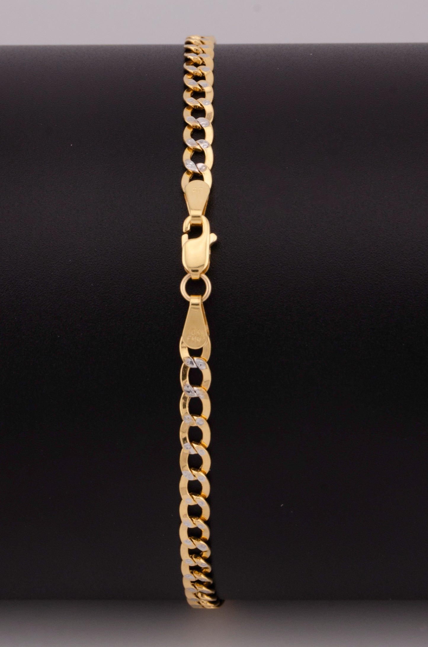 "PULSERA PARA ADULTO DE 20CM ESTILO CUBANA DIAMANTADA. ORO 10K #775-3542"