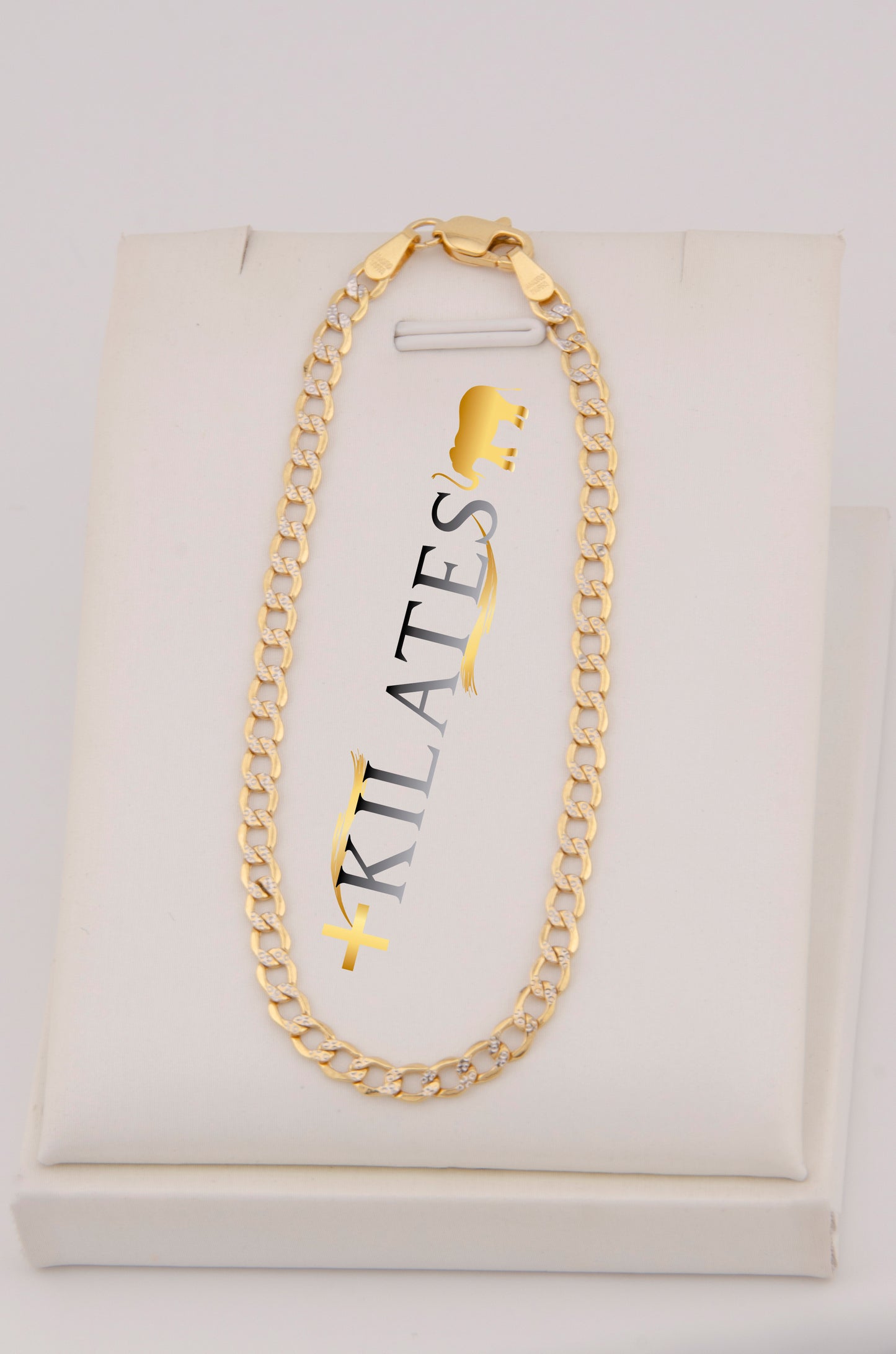 "PULSERA PARA ADULTO DE 18.6CM ESTILO CUBANA DIAMANTADA. ORO 10K #775-3543"