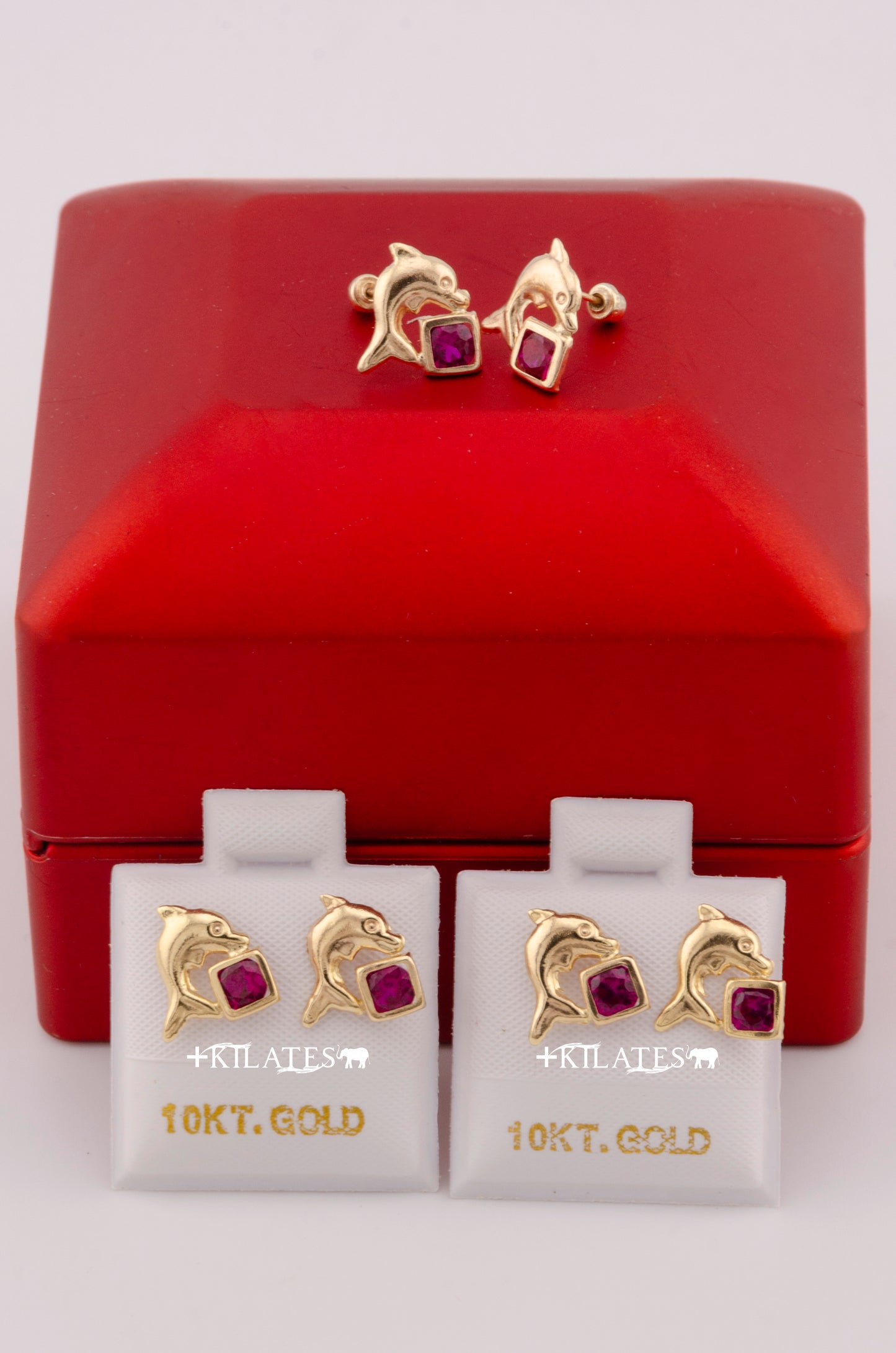 "ARETES PREMIUM DE DELFIN CON ZIRCONIA ROJA ROBI. ORO 10K #775-3611"