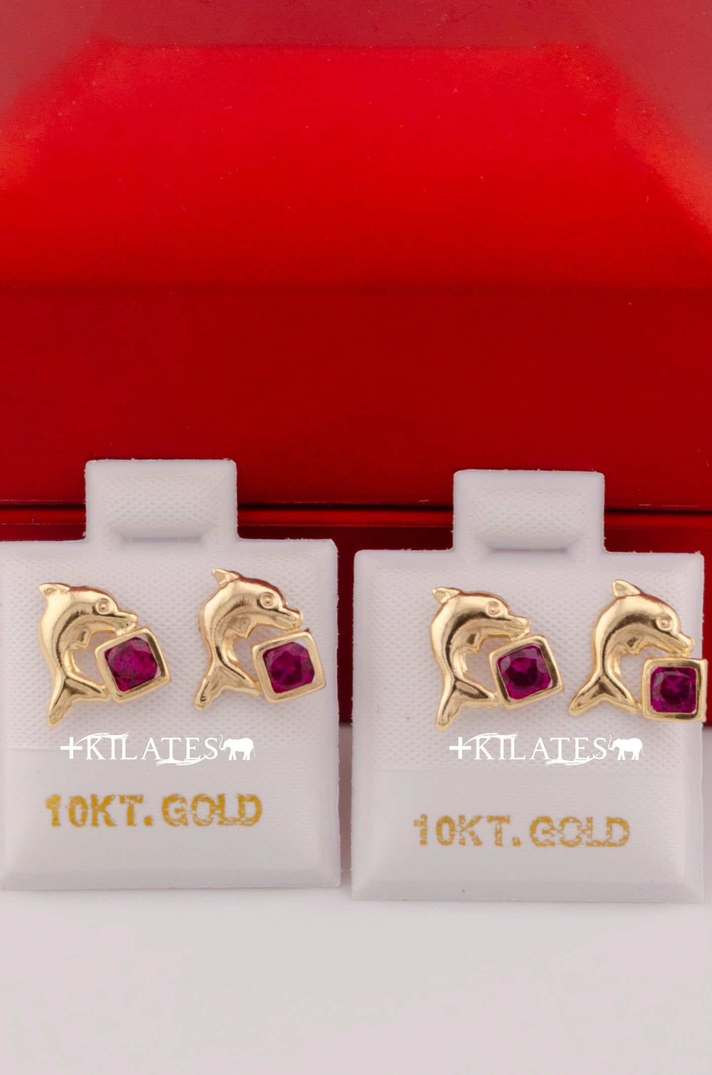 "ARETES PREMIUM DE DELFIN CON ZIRCONIA ROJA ROBI. ORO 10K #775-3611"