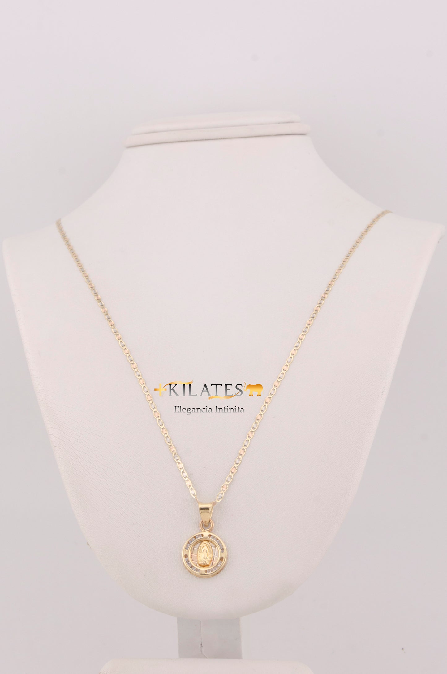 "CADENA PARA DAMA ESTILO 3 OROS CON DIJE OVALADO MEDIANO DE LA VIRGEN. ORO 10K #775-3619"