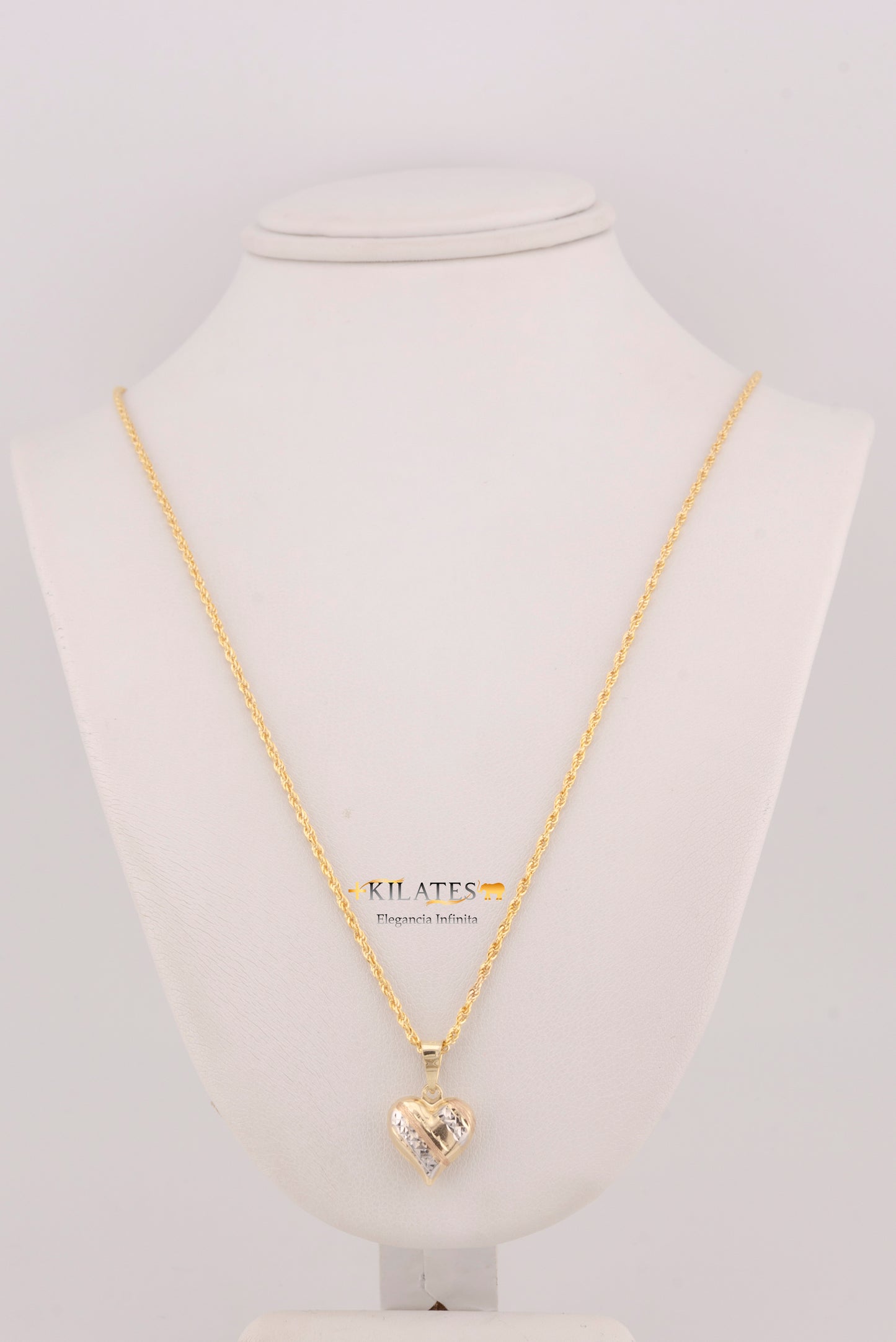 "CADENA PARA DAMA ESTILO LAZO CON DIJE DE CORAZON 3 TONOS GRANDE. ORO 10K #775-3687"