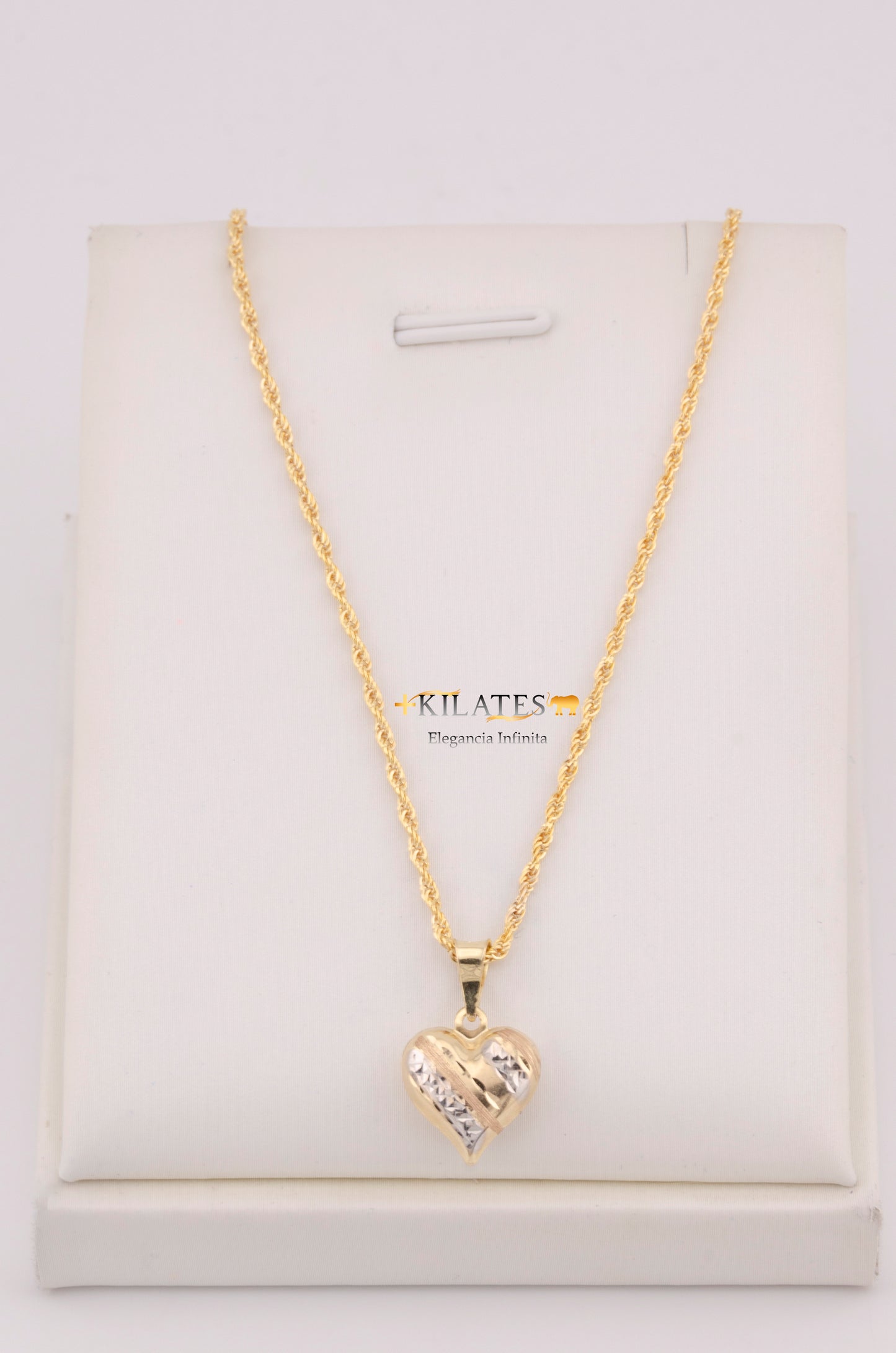 "CADENA PARA DAMA ESTILO LAZO CON DIJE DE CORAZON 3 TONOS GRANDE. ORO 10K #775-3687"
