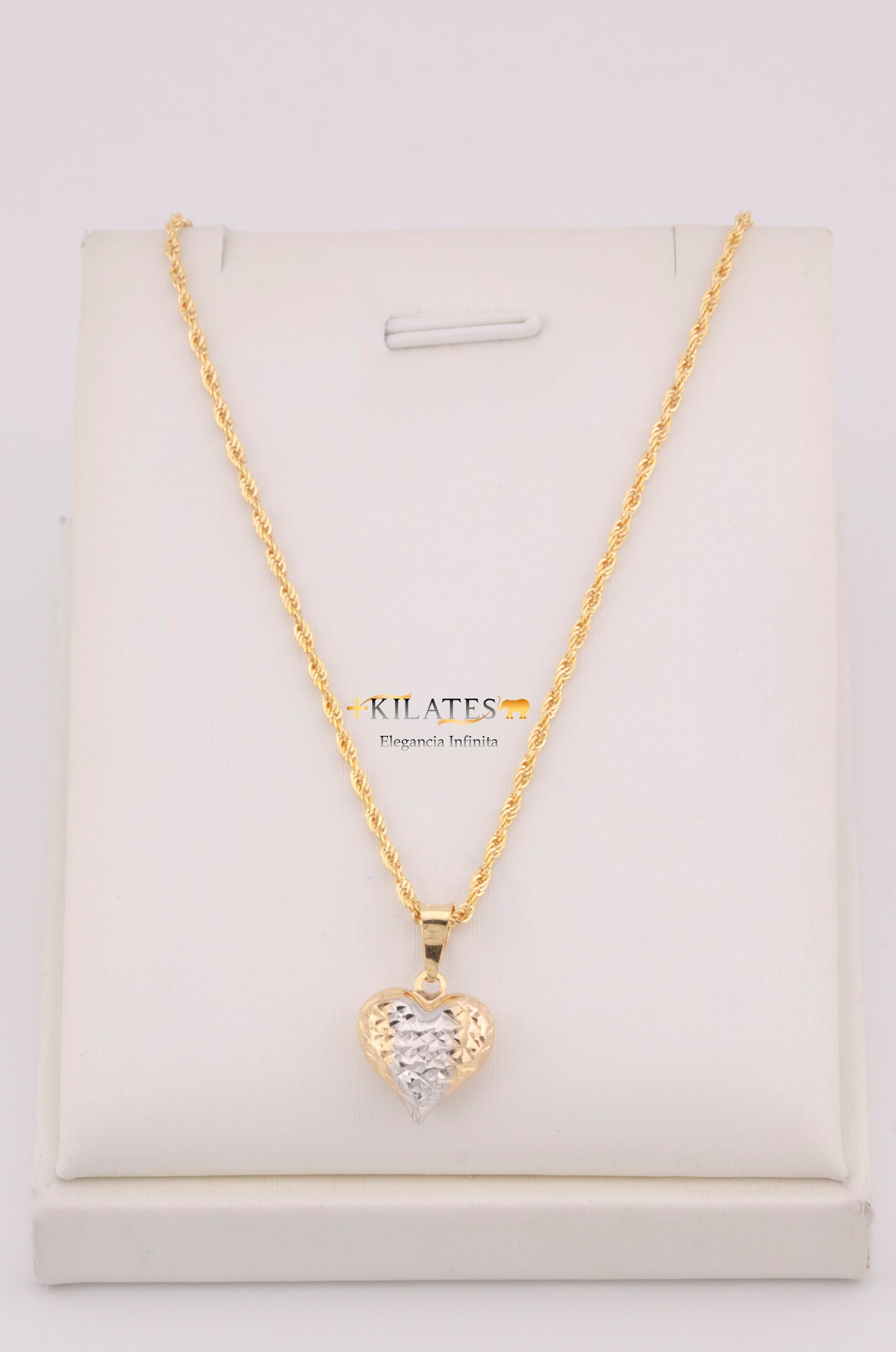 "CADENA PARA DAMA ESTILO LAZO CON DIJE DE CORAZON 3 TONOS GRANDE. ORO 10K #775-3689"