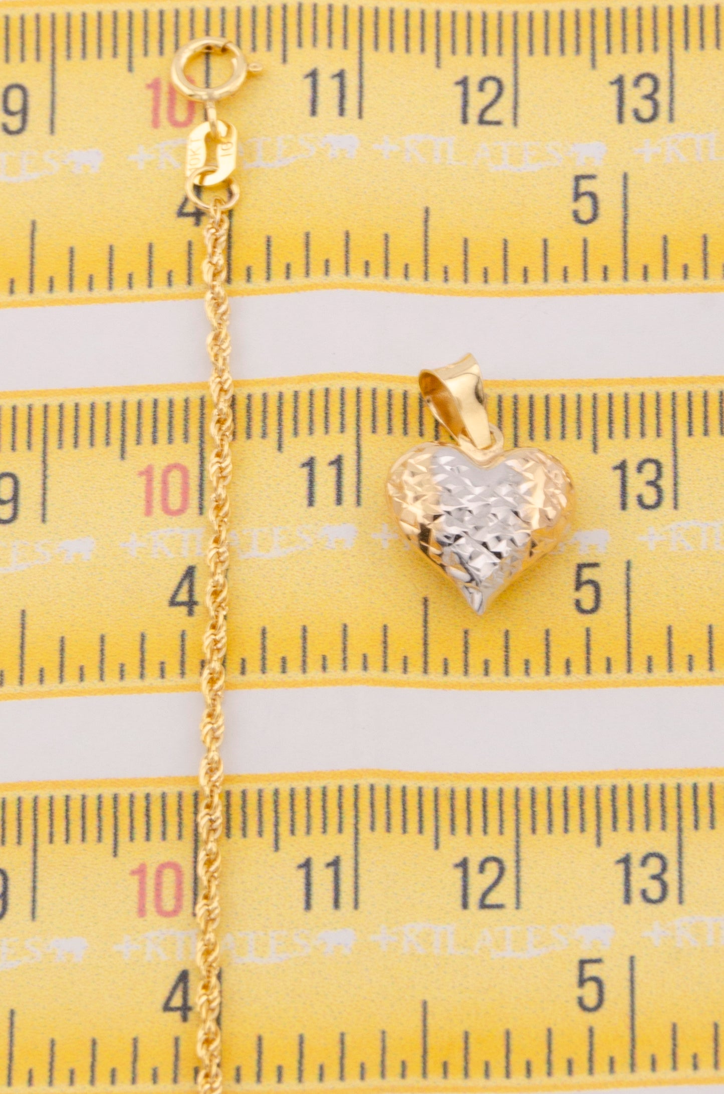 "CADENA PARA DAMA ESTILO LAZO CON DIJE DE CORAZON 3 TONOS GRANDE. ORO 10K #775-3689"